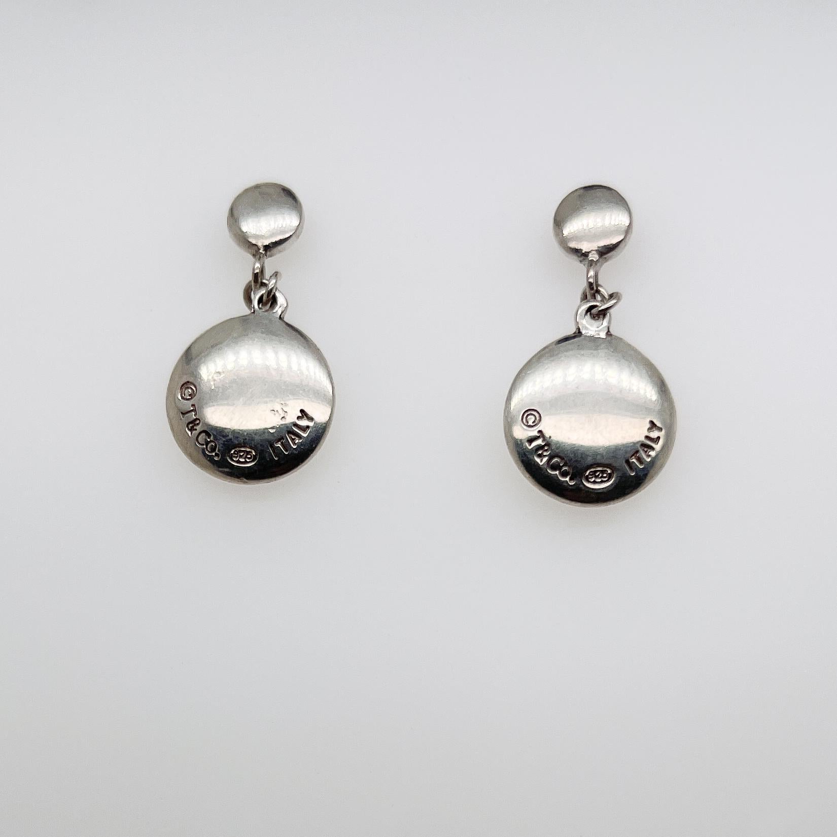 silver disc earrings dangle