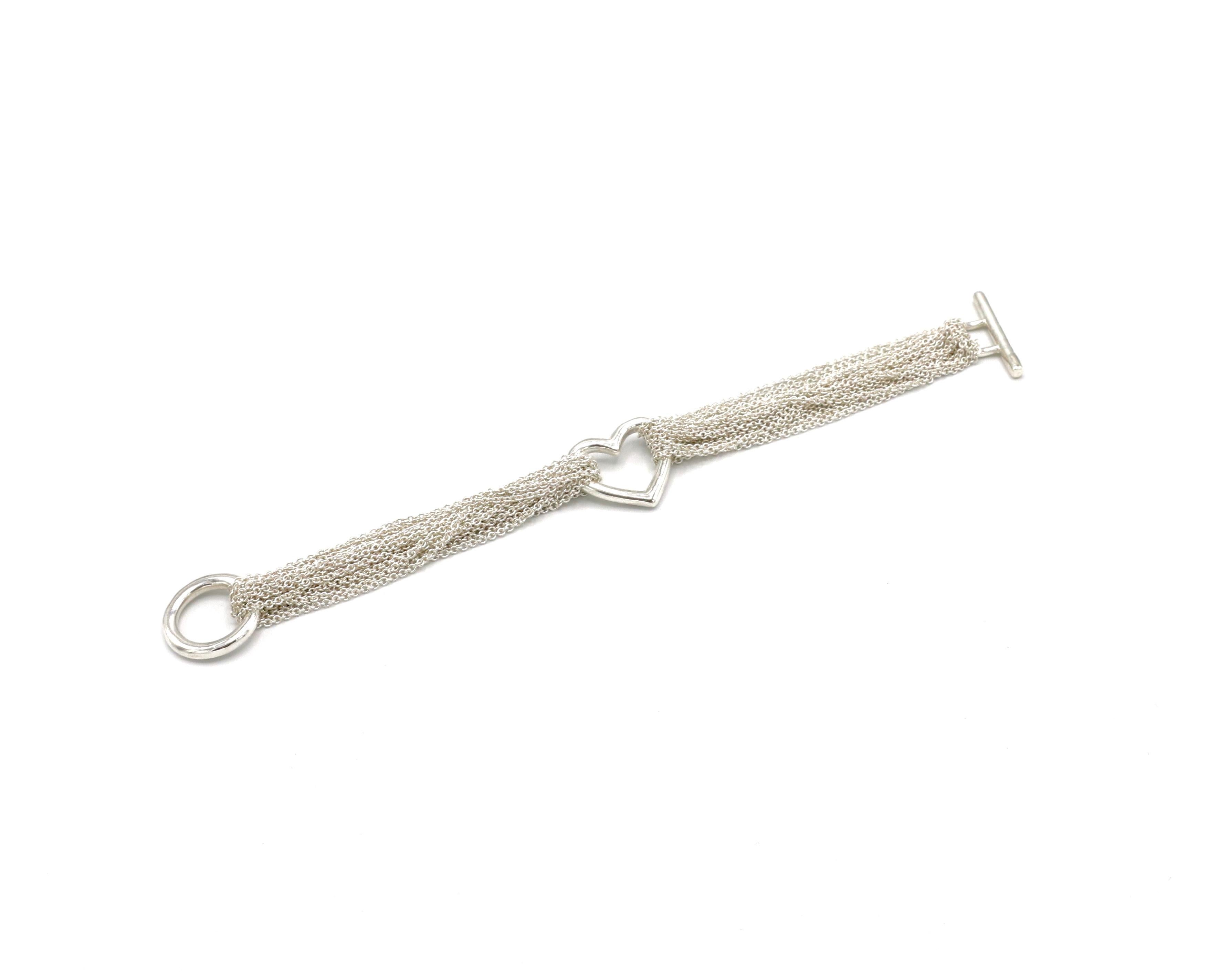 Vintage Tiffany & Co. Sterling Silver Heart Mesh Bracelet Toggle Closure

Metal: Sterling Silver
Weight: 30.84 grams
Clap: Toggle closure 
Signed: 