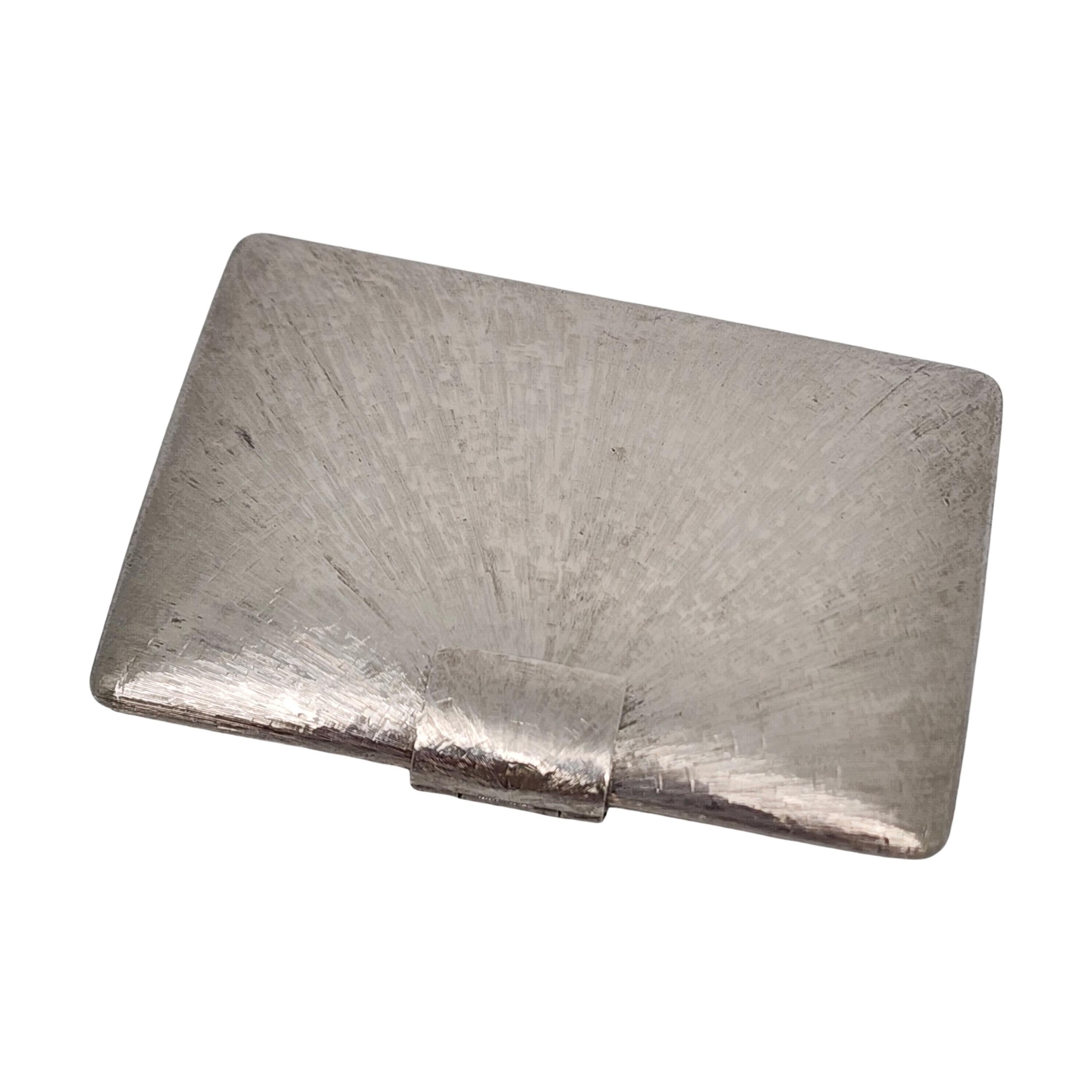 Vintage sterling silver mirror powder compact by Tiffany & Co with box and pouch.

No monogram or engraving

Beautiful vintage sunburst design, this mirror compact springs open with a fold-over flap. A mirror is on the interior of the lid, the