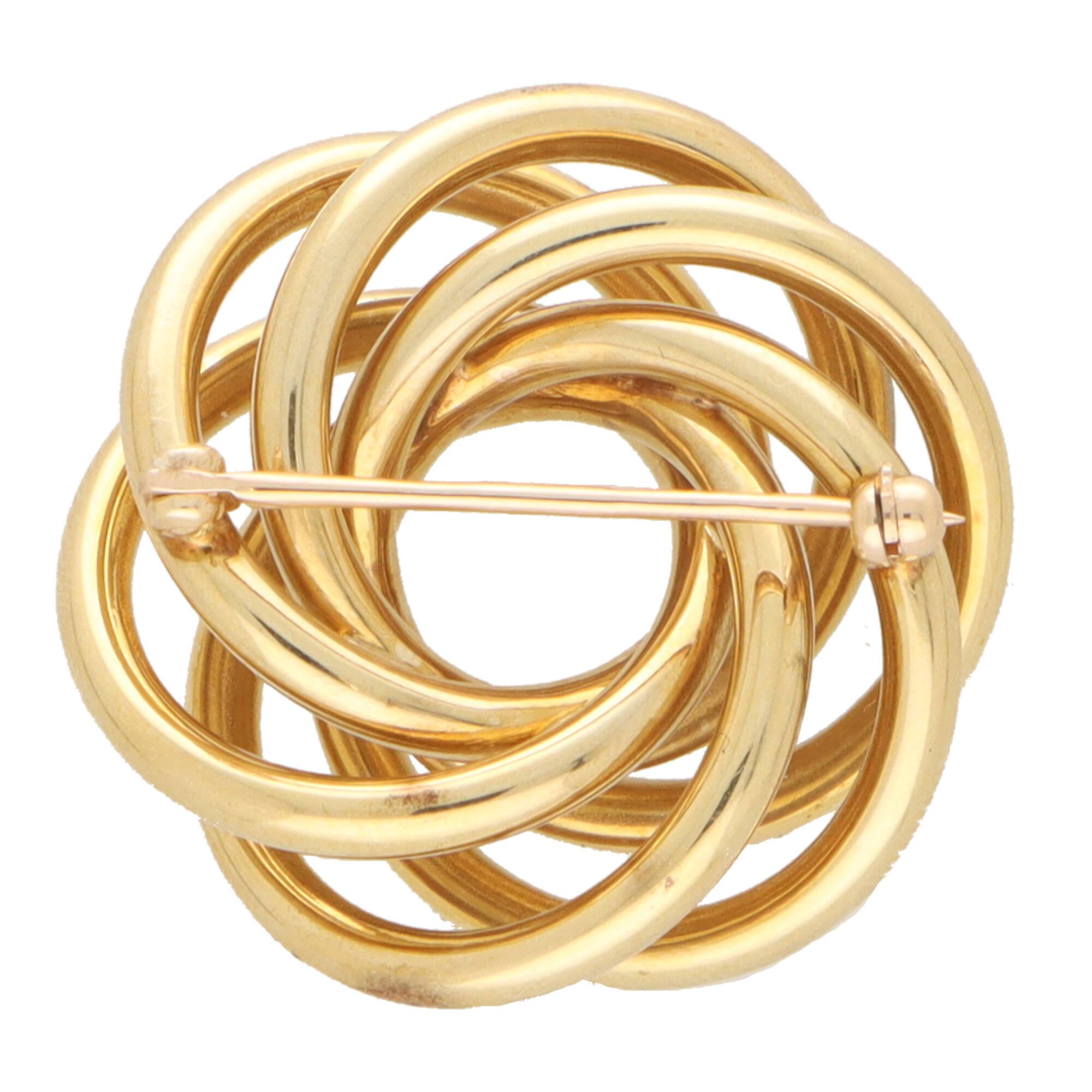 Women's or Men's Vintage Tiffany & Co. Swirl Brooch in 14k Yellow Gold For Sale