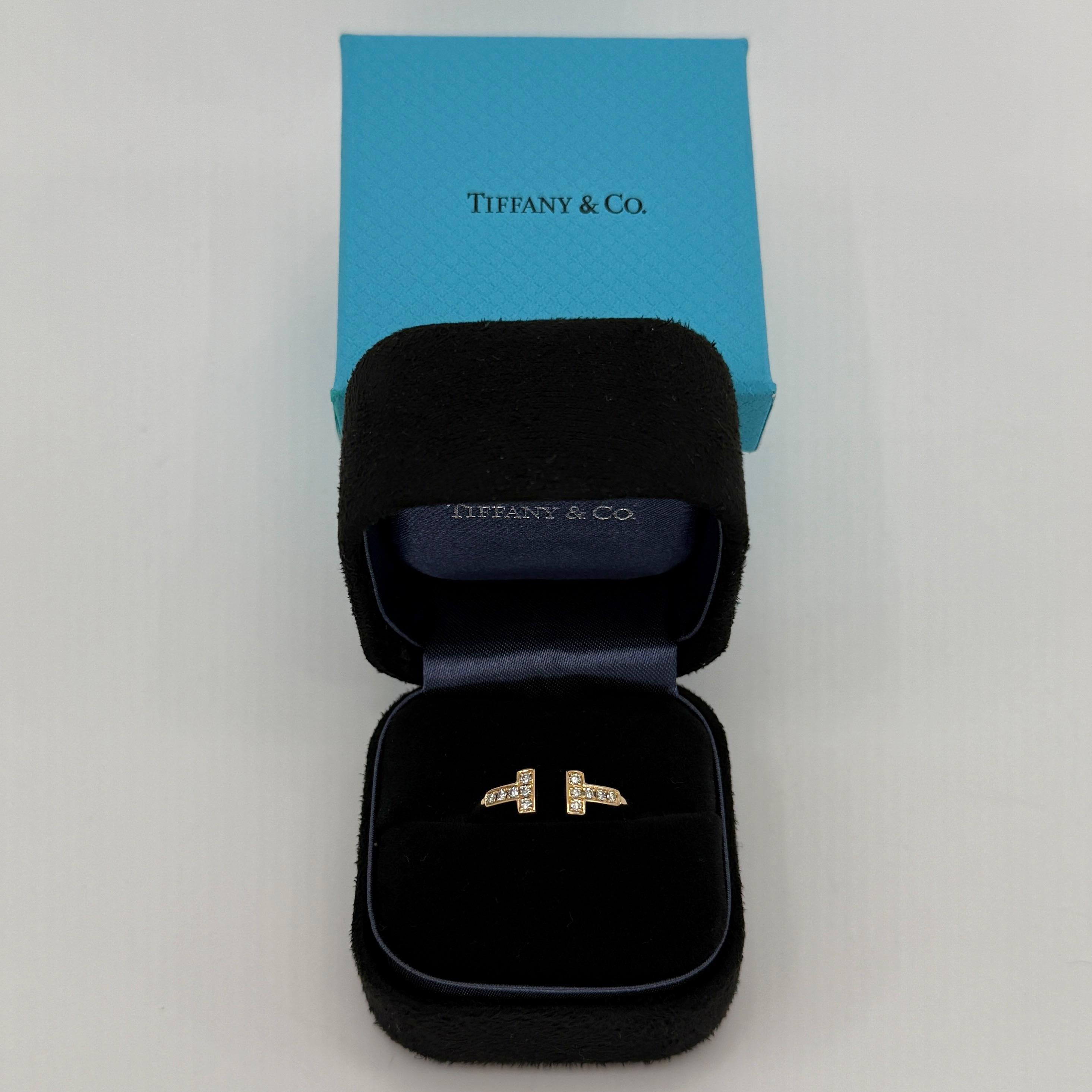 Vintage Tiffany & Co. Natural Diamond 'T Wire' 18k Rose Gold Band Ring.

A beautiful ring from the classic Tiffany & Co T Wire collection.
Set with 12 natural round brilliant cut diamonds of excellent quality. VS clarity E/F Colour. Approx.