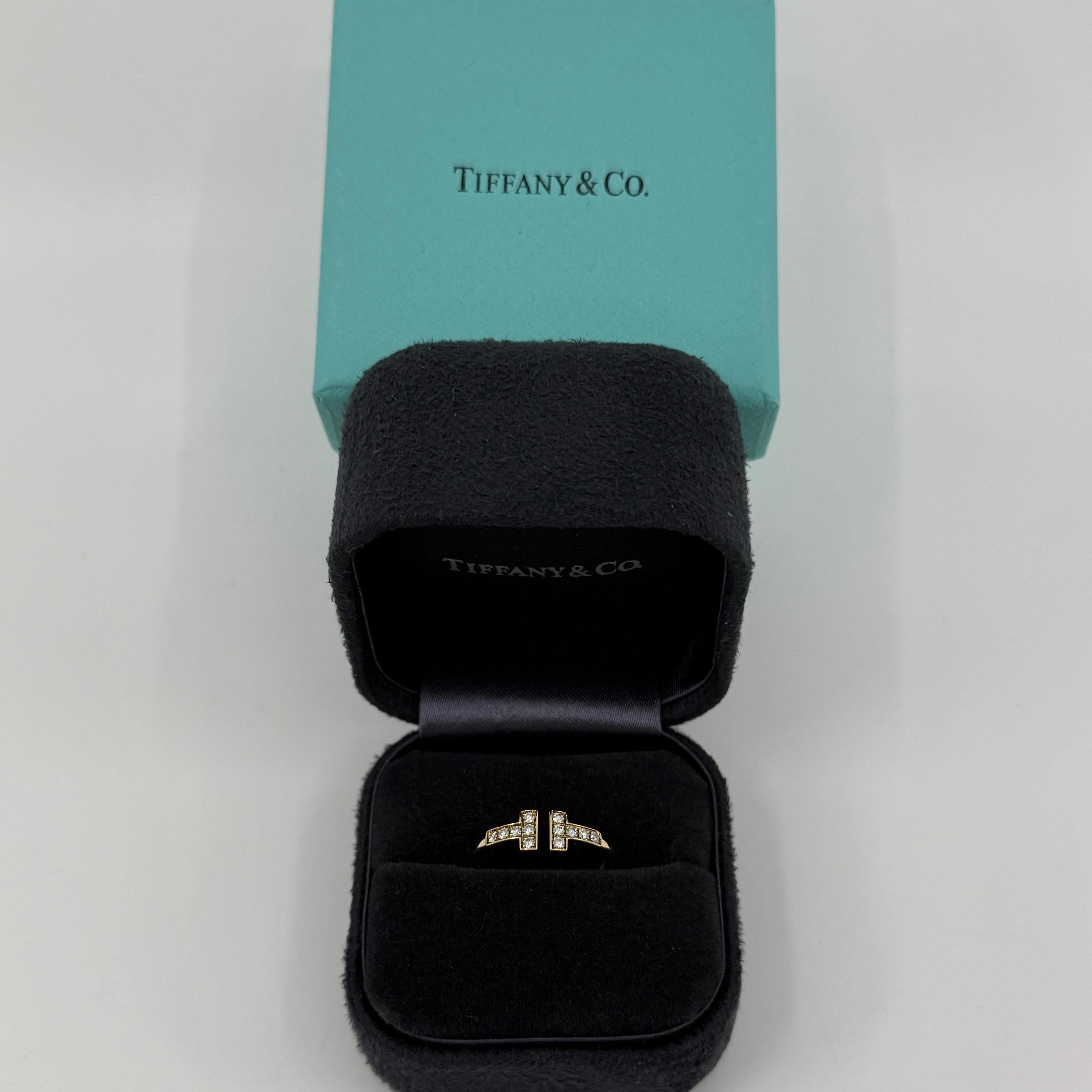 Vintage Tiffany & Co. Natural Diamond 'T Wire' 18k Yellow Gold Band Ring.

A beautiful ring from the classic Tiffany & Co T Wire collection.
Set with 12 natural round brilliant cut diamonds of excellent quality. VS-VVS clarity E/F Colour. Approx.