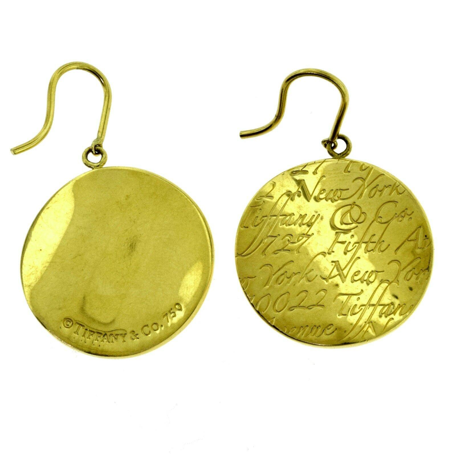 Vintage Tiffany & Co. Pendants d'oreilles en or jaune rond « Tiffany Notes » avec pendentifs Bon état - En vente à Miami, FL