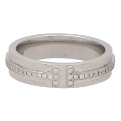 Bague vintage Tiffany &amp;amp; Co. "Tiffany T" en or blanc 18 carats avec diamants étroits