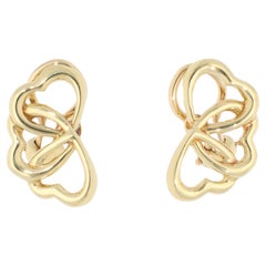 Tiffany & Co. d'epoca. Orecchini a clip con triplo cuore in oro giallo