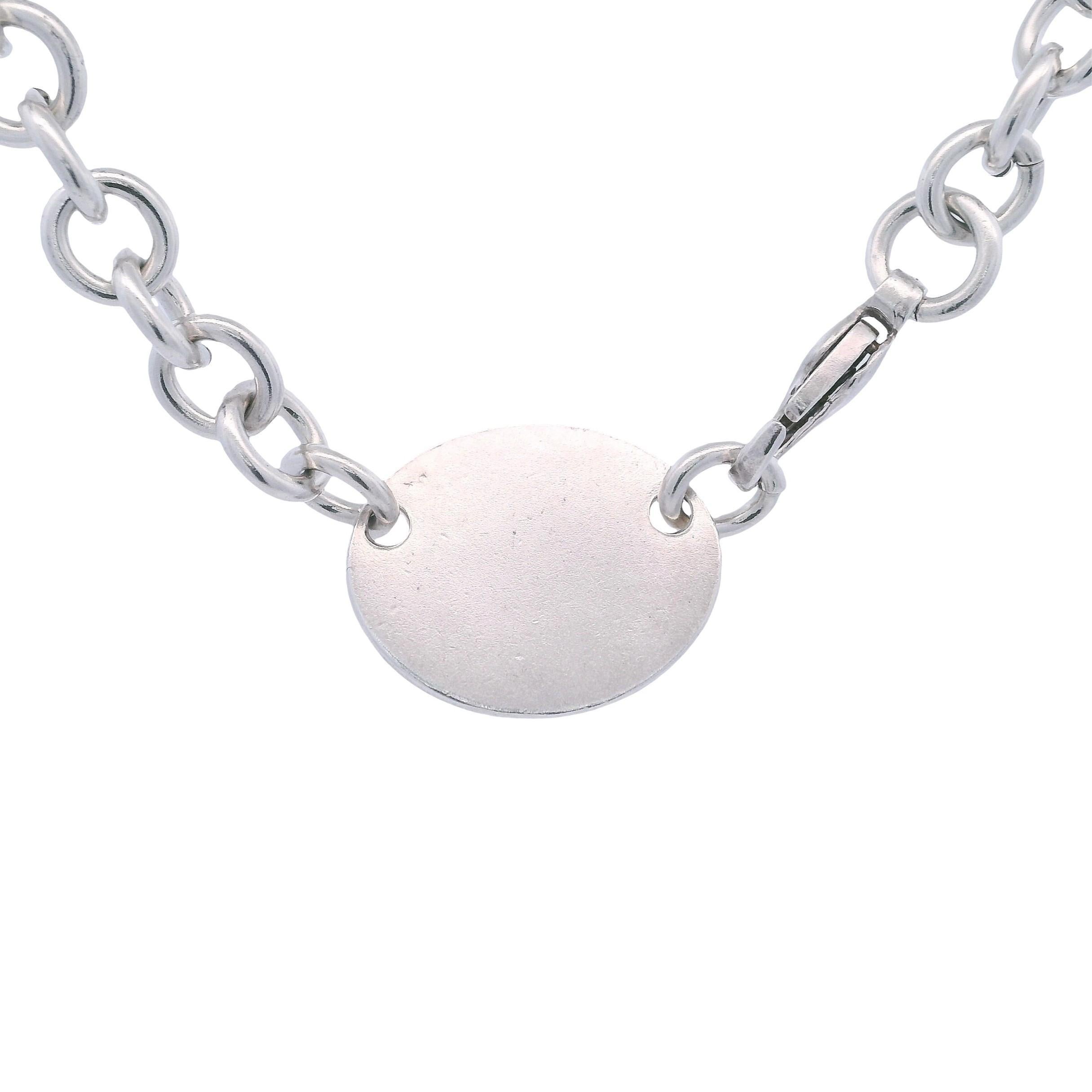 da uomo o donna Tiffany & Co. d'epoca. Collana con medaglietta ovale Ultra in argento sterling in vendita