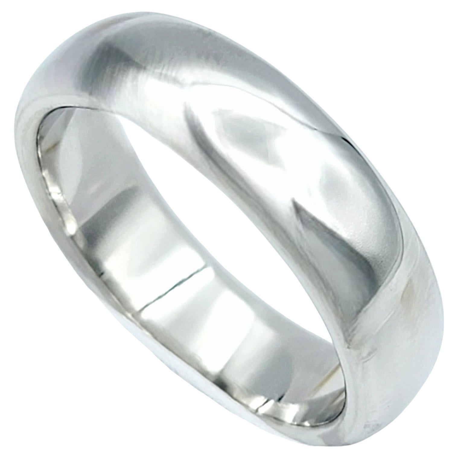 Ring size: 9 

This gorgeous Tiffany & Co. platinum wedding band ring, with its vintage half-round style and high polish finish, is a beautiful work of art to add to any jewelry collection. The use of platinum sets this ring apart, as platinum is