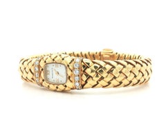 Vintage Tiffany & Co. Bracelet montre Vannerie en or jaune 18 carats avec diamants