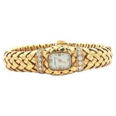 Vintage Tiffany & Co. Bracelet montre Vannerie en or jaune 18 carats avec diamants
