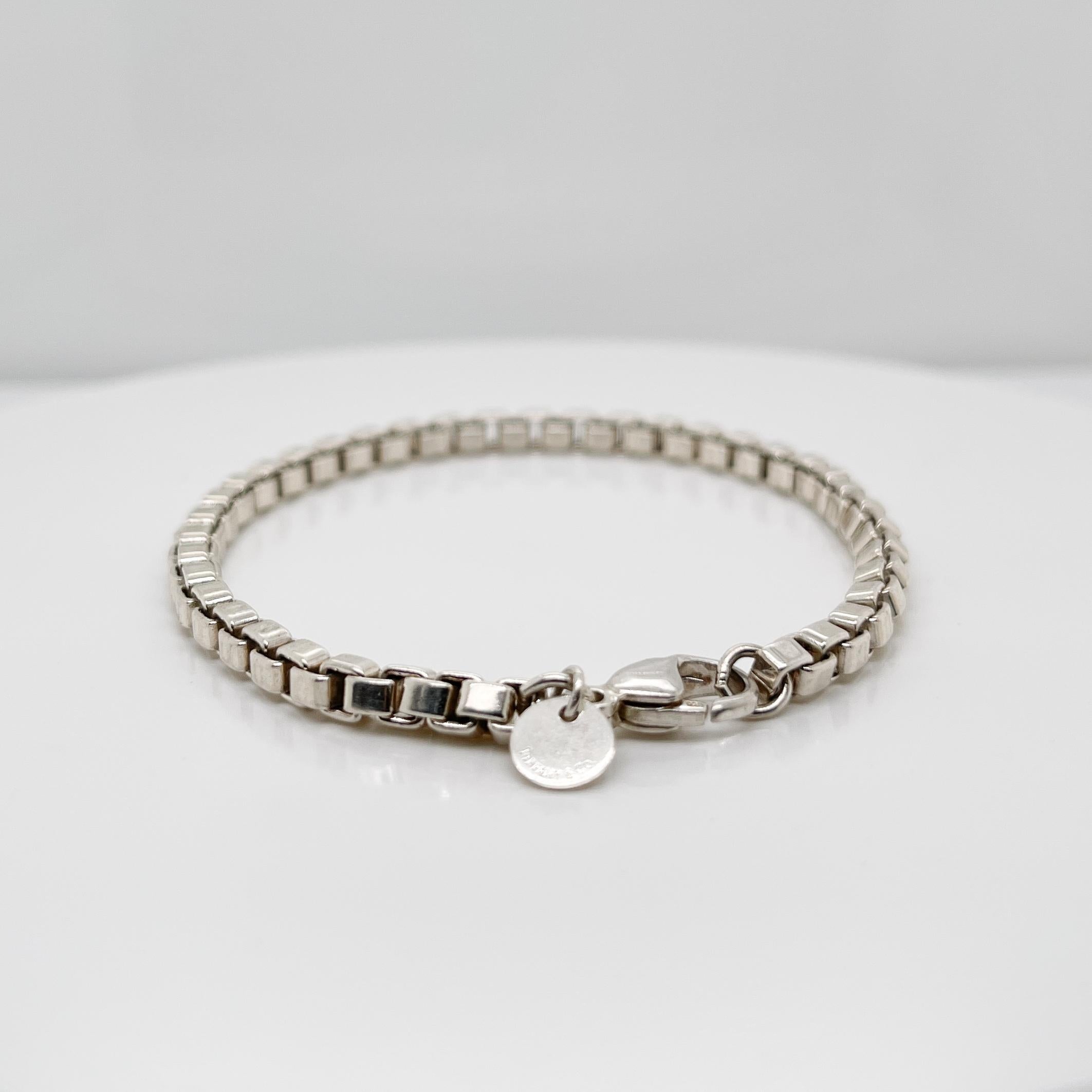 A fine Tiffany & Co. Venetian box link bracelet.

In sterling silver.

Classic Tiffany design!

Date:
20th Century

Overall Condition:
It is in overall good, as-pictured, used estate condition with some very fine & light surface scratches and other