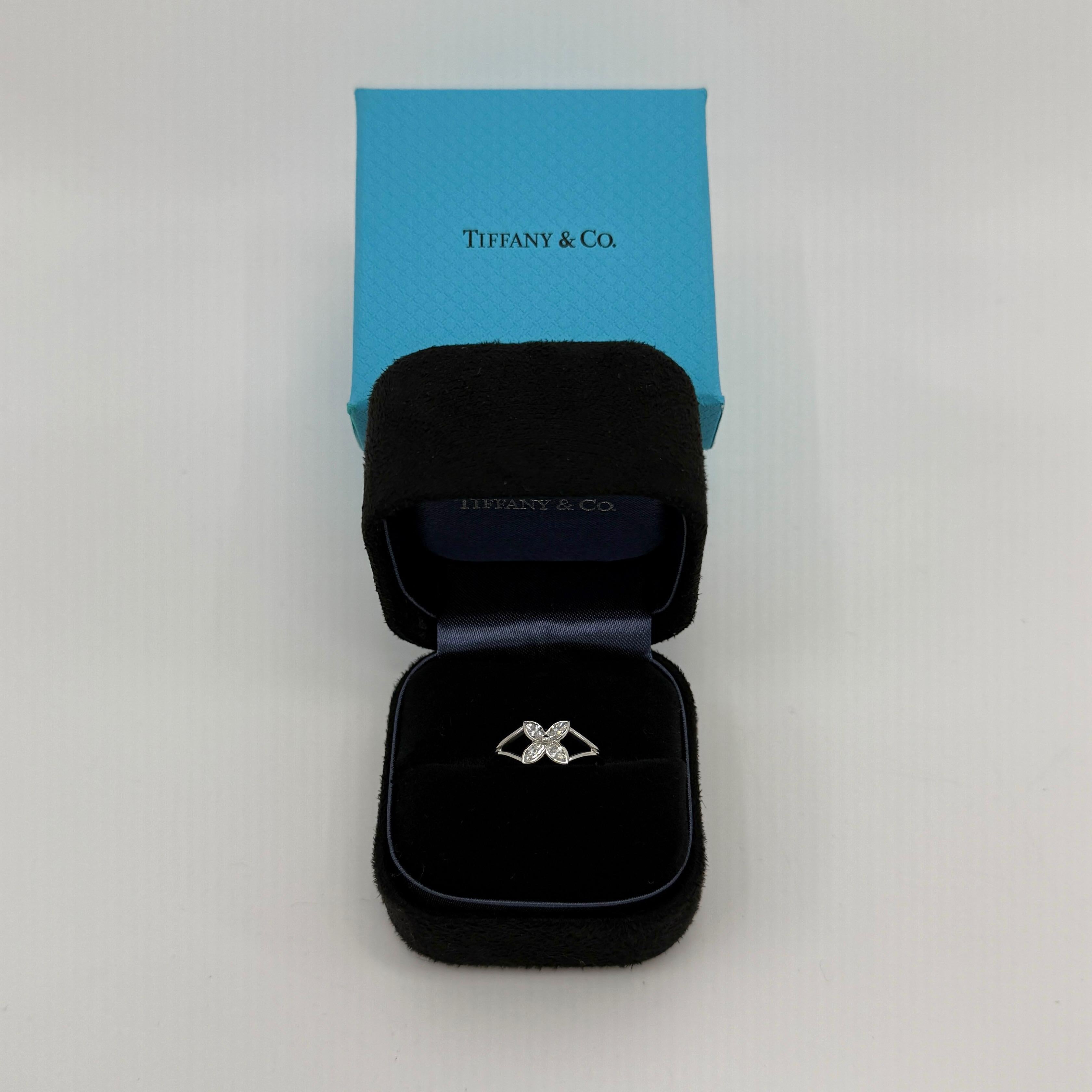 Vintage Tiffany & Co. Victoria Natural Diamond 950 Platinum Ring.

A beautiful platinum cluster ring set with a stunning 4mm marquise cut natural diamonds.
Superb colour, clarity and cut. VS-VVS clarity E/F colour with an excellent cut.
Fine