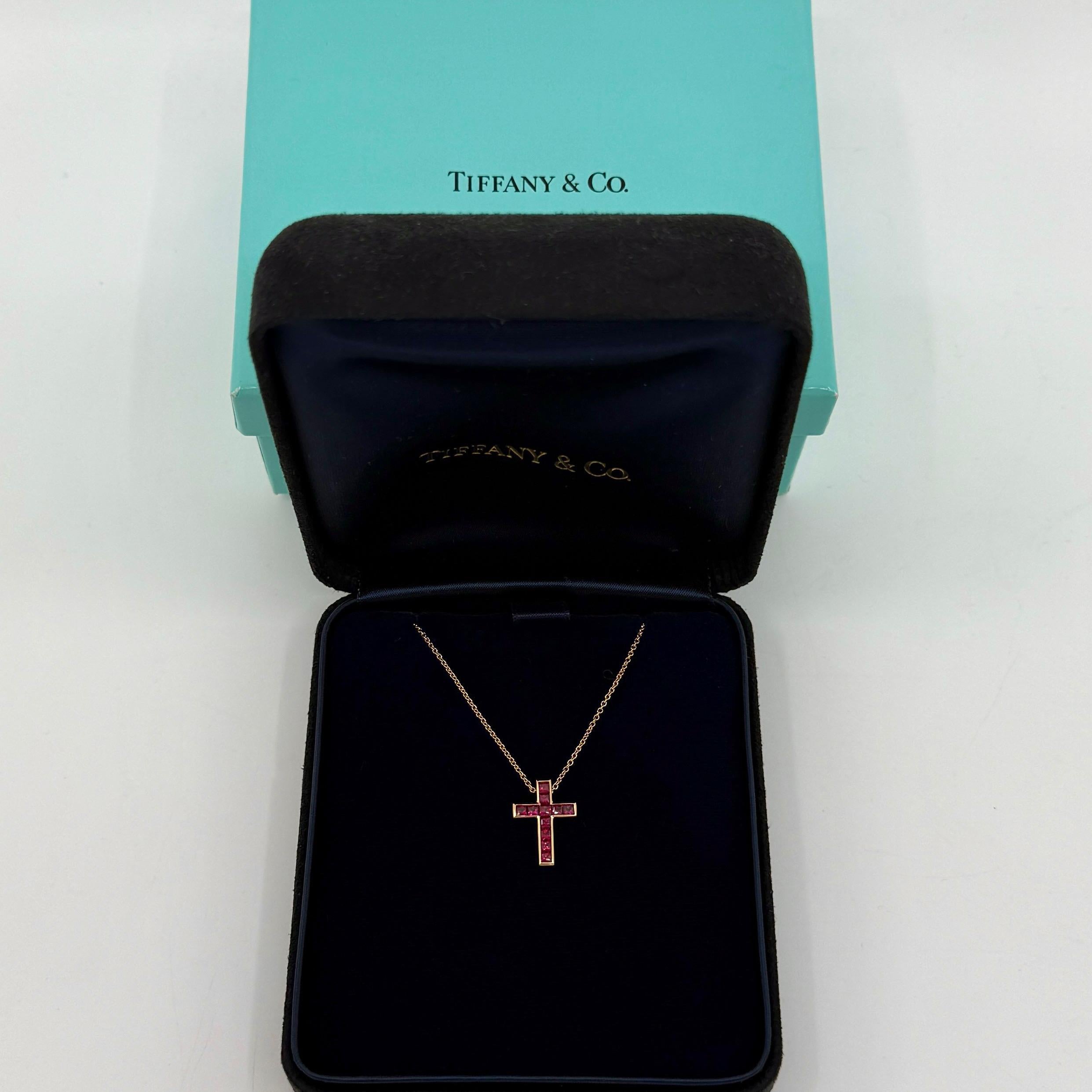 Vintage Tiffany & Co. Vivid Red Ruby 18k Yellow Gold Cross Pendant Necklace

A beautiful and rare 18k yellow gold Latin cross with top grade princess cut vivid red natural rubies Measuring approx. 2mm and beautifully bezel set.
Fine jewellery houses