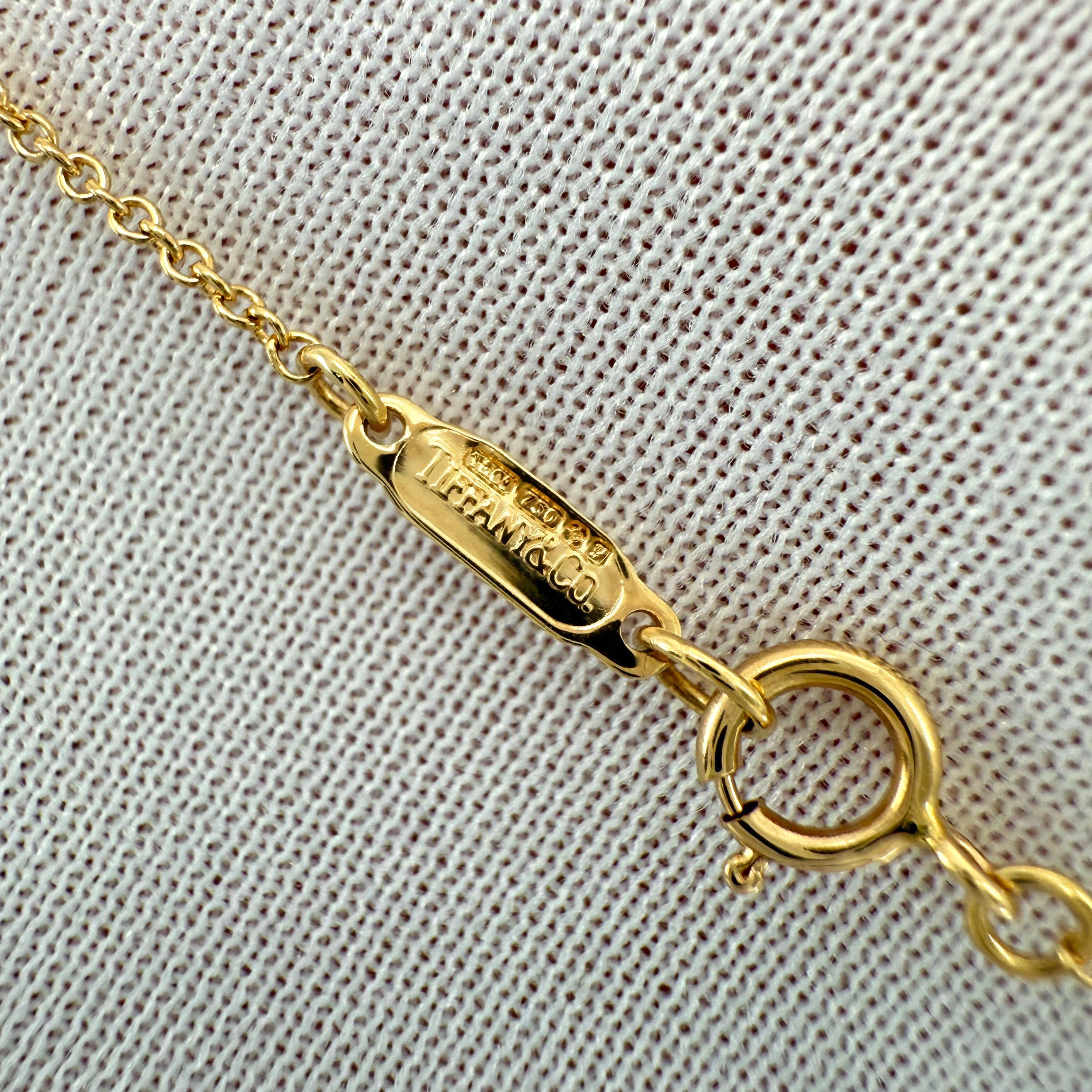 Vintage Tiffany & Co. Vivid Red Ruby 18k Yellow Gold Cross Pendant Necklace For Sale 1