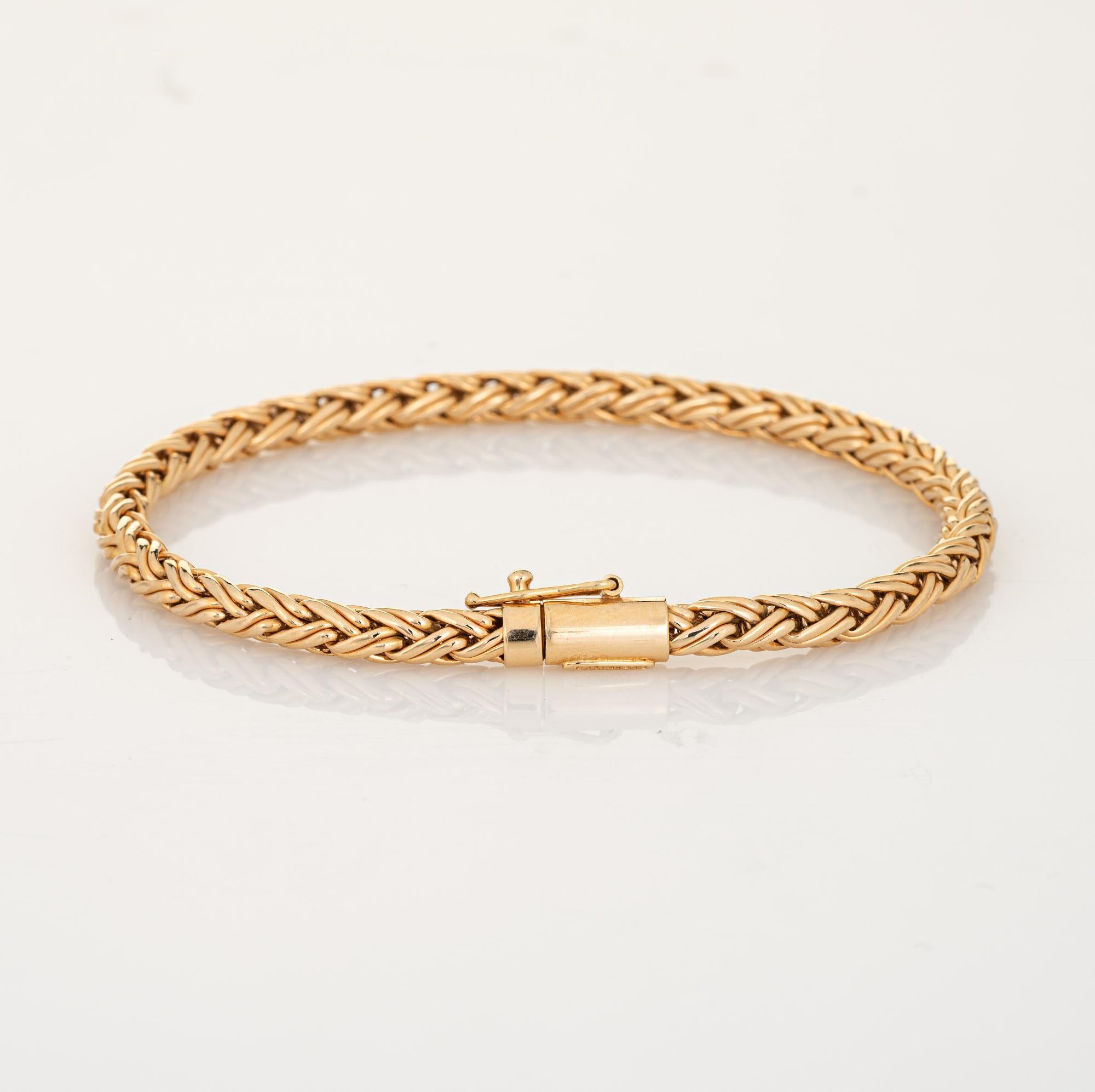 Stylish and finely detailed vintage Tiffany & Co wheat link bracelet, crafted in 14k yellow gold.  

The bracelet features a 4mm wheat link chain, terminating to a slip lock clasp. Measuring 7 1/2 inches in length the bracelet is great worn alone or
