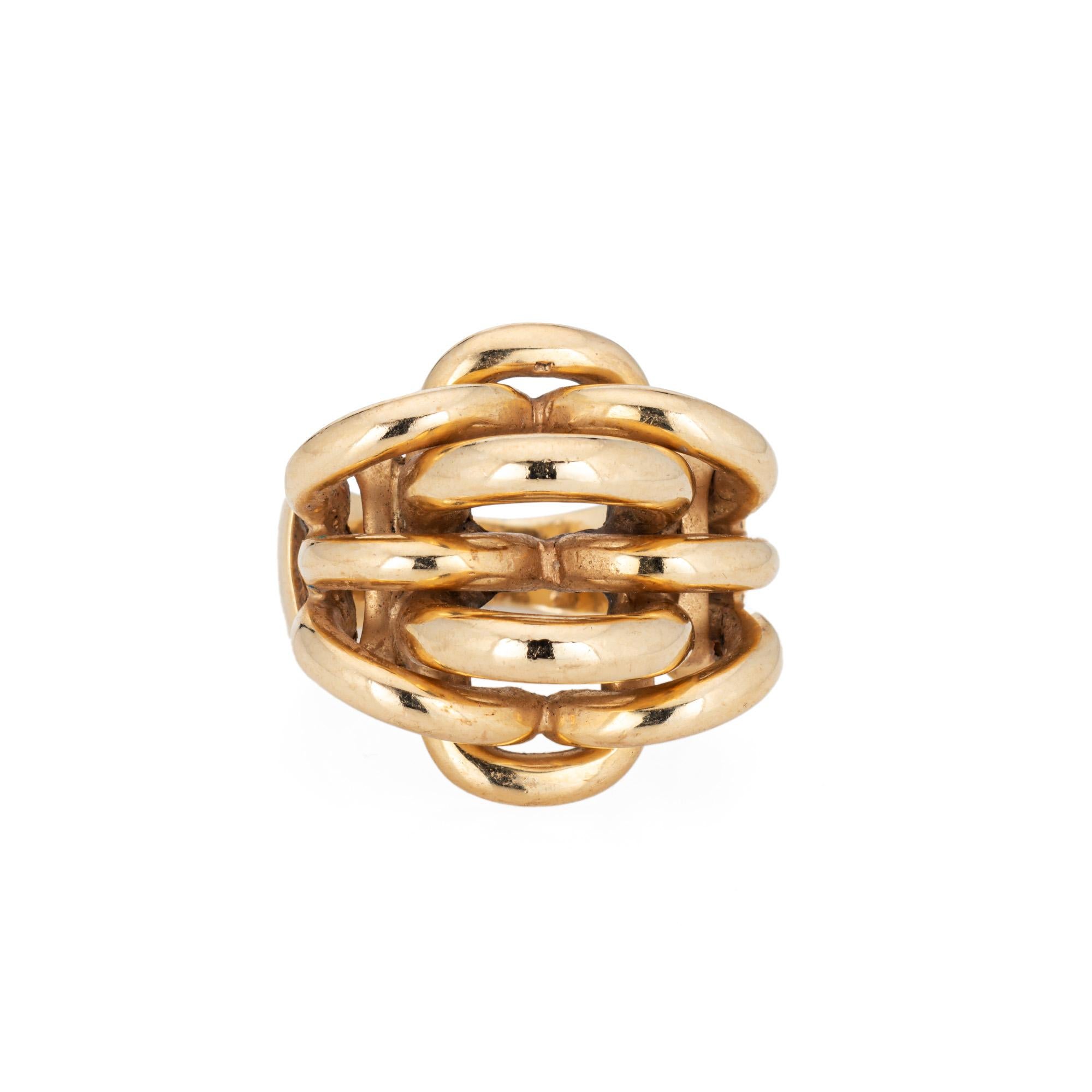 Vintage Tiffany & Co 'Woven' dome ring crafted in 14 karat yellow gold (circa 1980s to 1990s).  

The domed band features a visually striking woven design and makes a great statement on the hand. Weighing 16.8 grams the ring has a weighty feel on