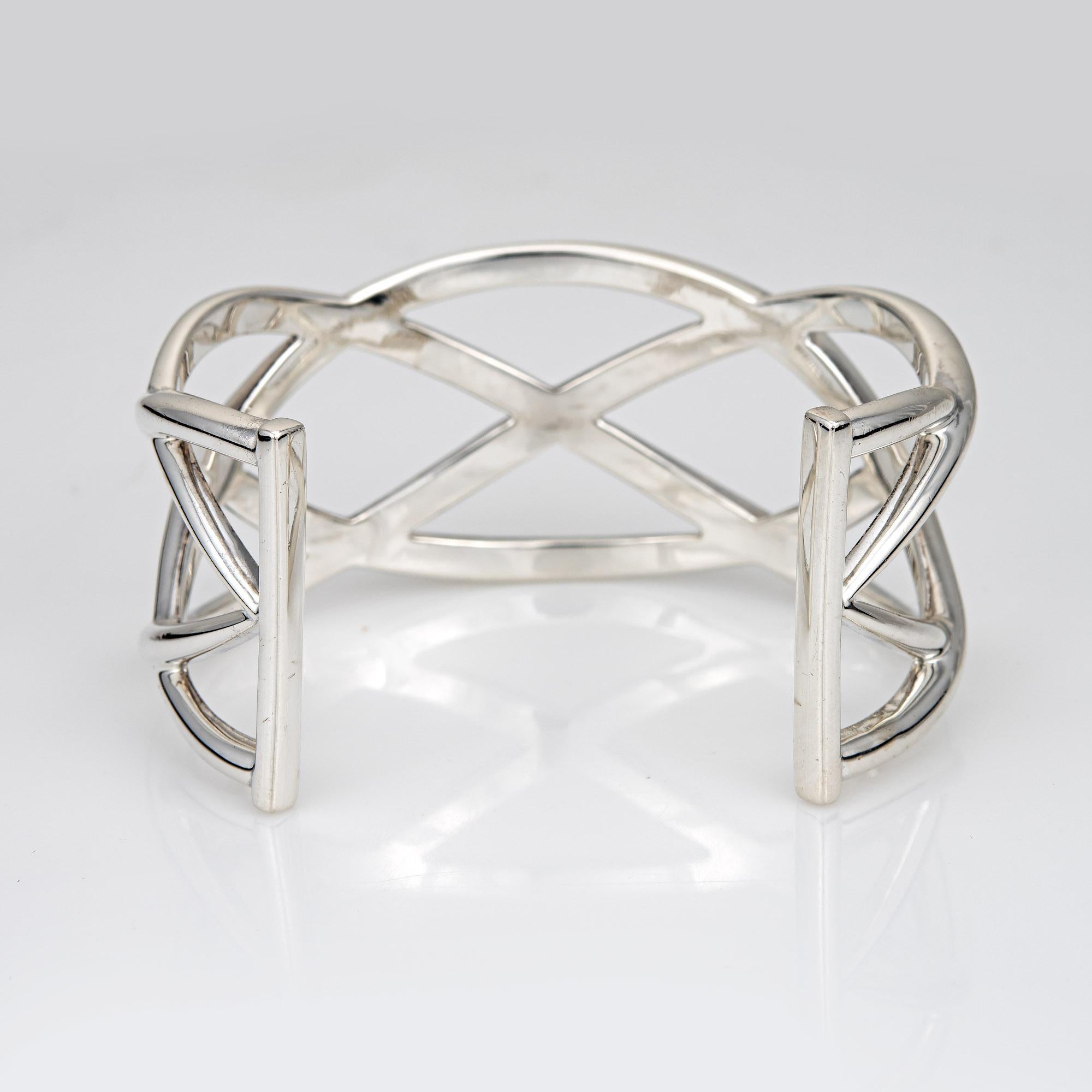 Stylish and finely detailed vintage Tiffany & Co cuff bracelet, crafted in sterling silver.  

The woven cuff bracelet is wide (28mm - 1.10 inches) and makes a great statement on the wrist. The bracelet is designed to fit a wrist up to 6 1/2 inches