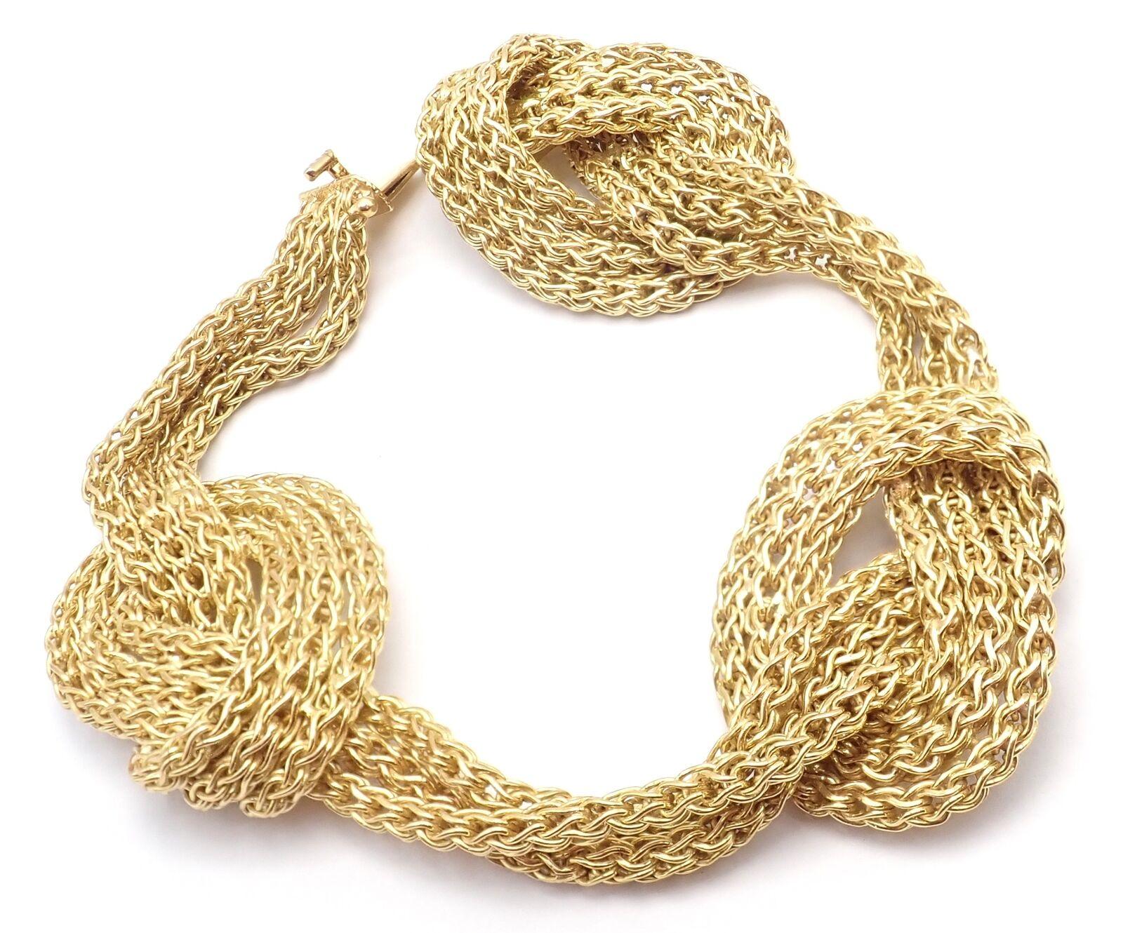 18k Yellow Gold Woven Knot Link Vintage Bracelet by Tiffany & Co.
Details: 
Length: 7.5