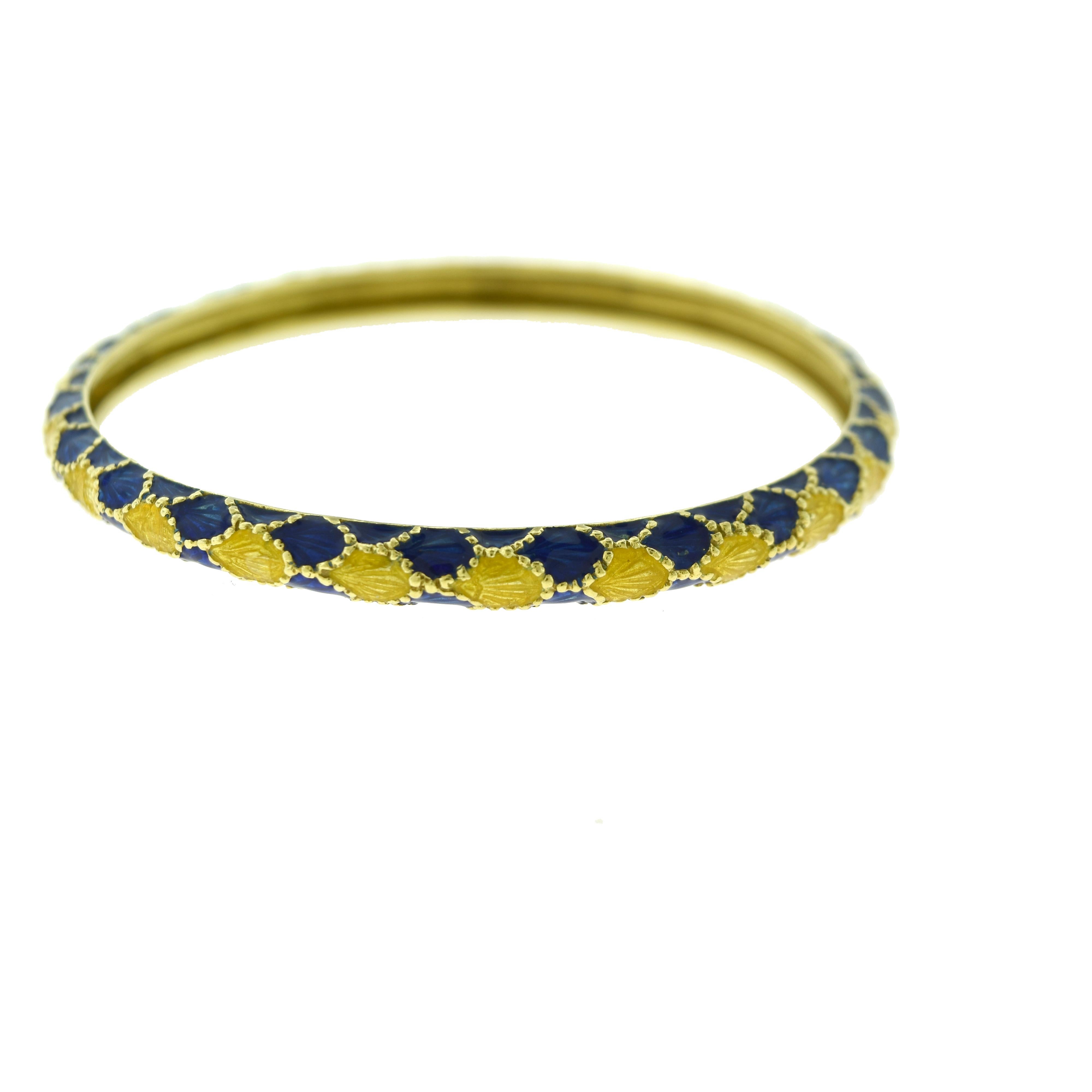 Brilliance Jewels, Miami
Questions? Call Us Anytime!
786,482,8100

Size: Small to Medium!
Designer: Tiffany & Co.
Style: Bracelet Bangle
Metal: 18k Yellow Gold
Non-Metal Material: Blue Enamel
Total Item Weight (grams): 25.3
Bangle Width: 5.38 mm