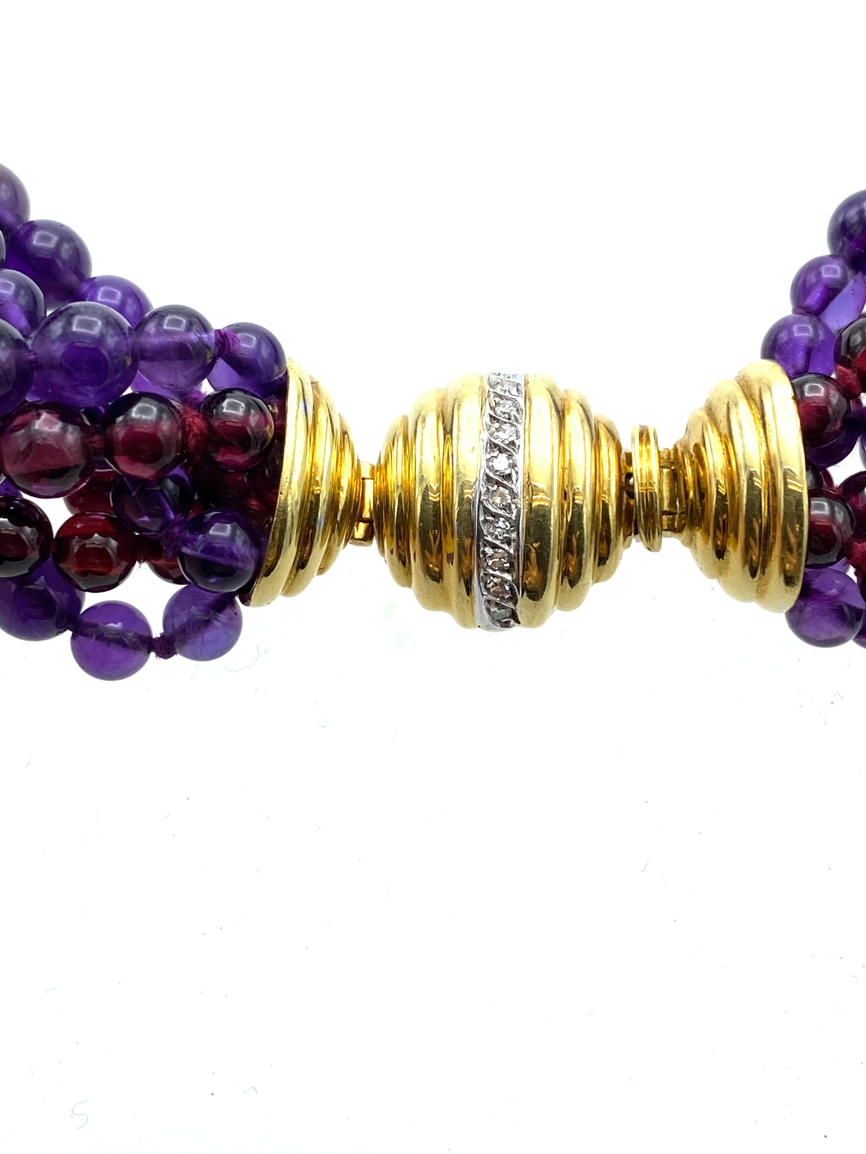 Product details:
Designed in 1980's by Tiffany and Co. in Italy.
Featuring 18K Yellow gold with 0.11 points of single cut diamonds box in clasp.
Total of eight strands of beads, four strands of amethyst and four strands of garnet, the beads measure