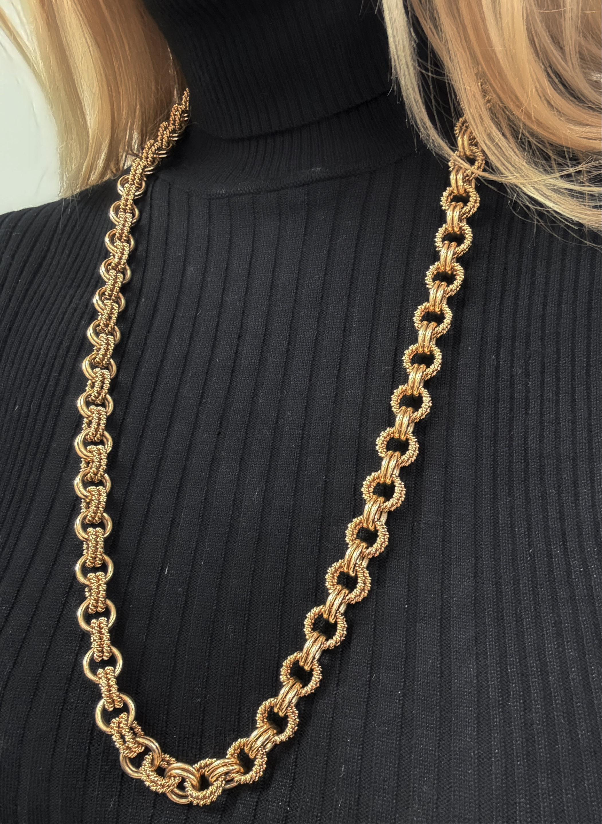 This classic vintage necklace by Tiffany & Co. is designed in a fancy cable link chain with double circular links alternating between polished and twisted textured finish. Super comfortable and perfect for layering and everyday wear!

Measurements: