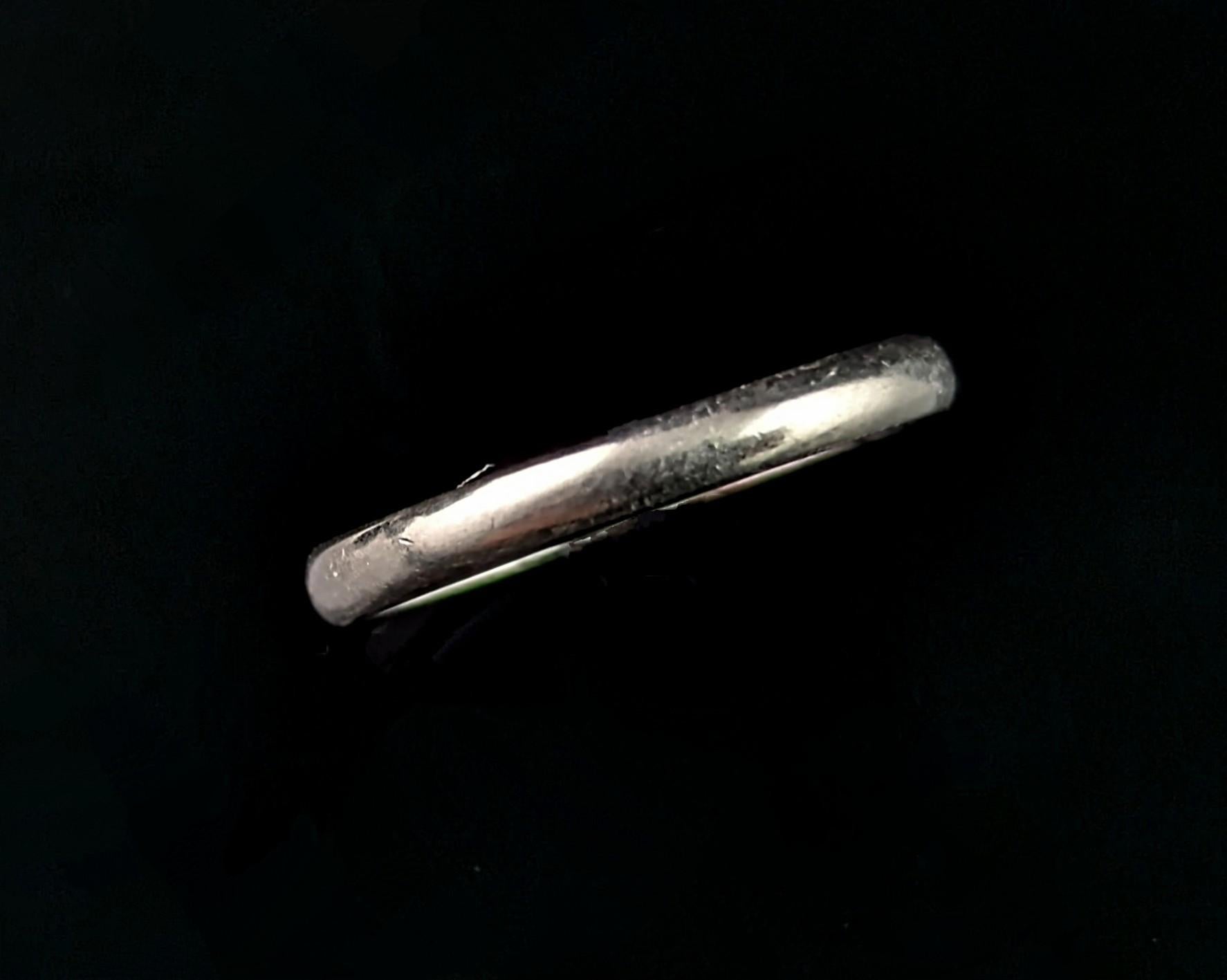 A beautiful vintage Tiffany Classic platinum band ring.

From the timeless Tiffany classic range, early 2000s, this beautifully crafted ring has a D profile with a soft brushed platinum finish.

A perfect choice as a gift or wedding / engagement