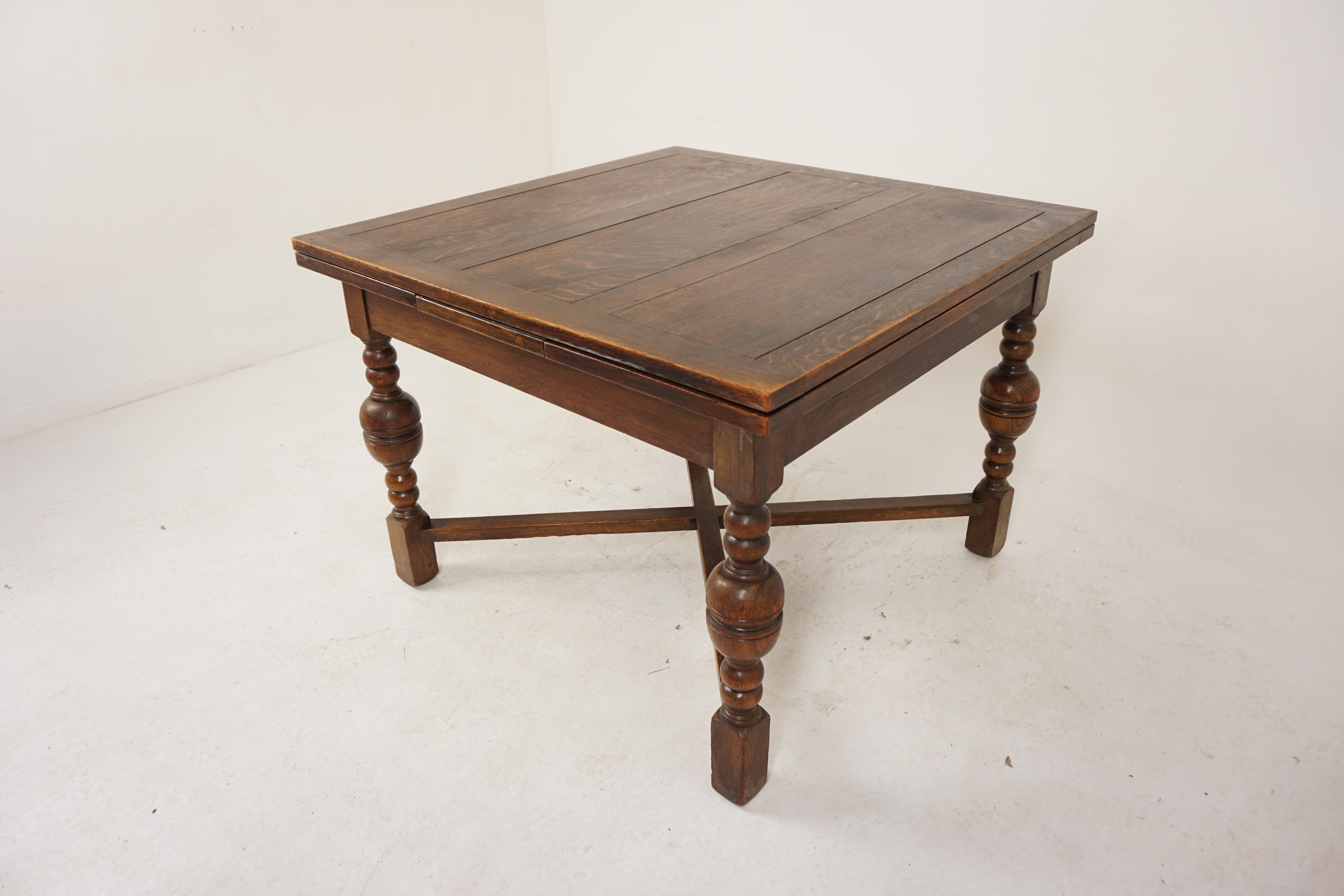 Vintage Tiger Oak Refectory Table, Draw Leaf, Pull Out Table, Scotland 1920, H899

Scotland 1920
Solid Oak
Original Finish
Solid Panelled Oak Top
Above two pull out ends
Raised upon heavy turned bulbous legs
United by a heavy x stretcher on the