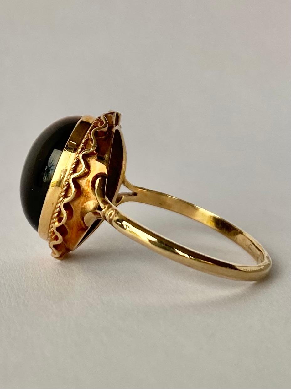 This tigers eye stone is truly mesmerising. They give the classic deep brown colour and the stripe of a lighter brown running through. The setting is modelled in 9ct gold. 

Size S or 9
Face Dimensions: 17x13mm 

Weight: 3.3g