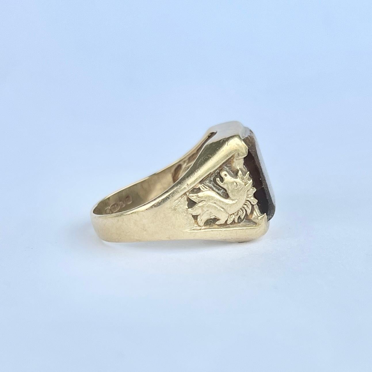 This tigers eye stone is truly mesmerising. They give the classic brown colour with fine stripes of darker brown running through it. The setting is modelled in 9ct gold. Hallmarked London 1978.

Size: S or 9 
Face Dimensions: 11.5x10mm 

Weight: 5.9g