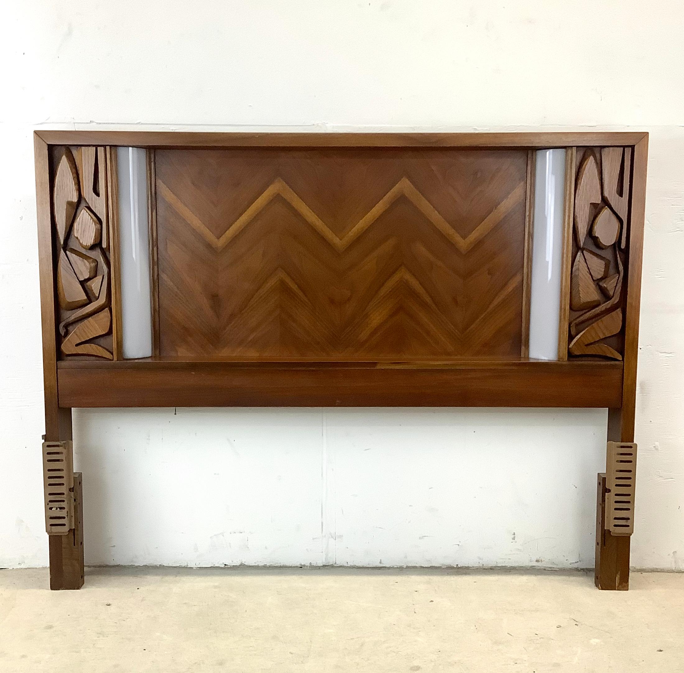 Transform your bedroom into a vintage oasis with this striking vintage tiki style brutalist headboard- a rare gem from the mid-century era manufactured by the renowned United Furniture. This headboard is a testament to the unique and bold design