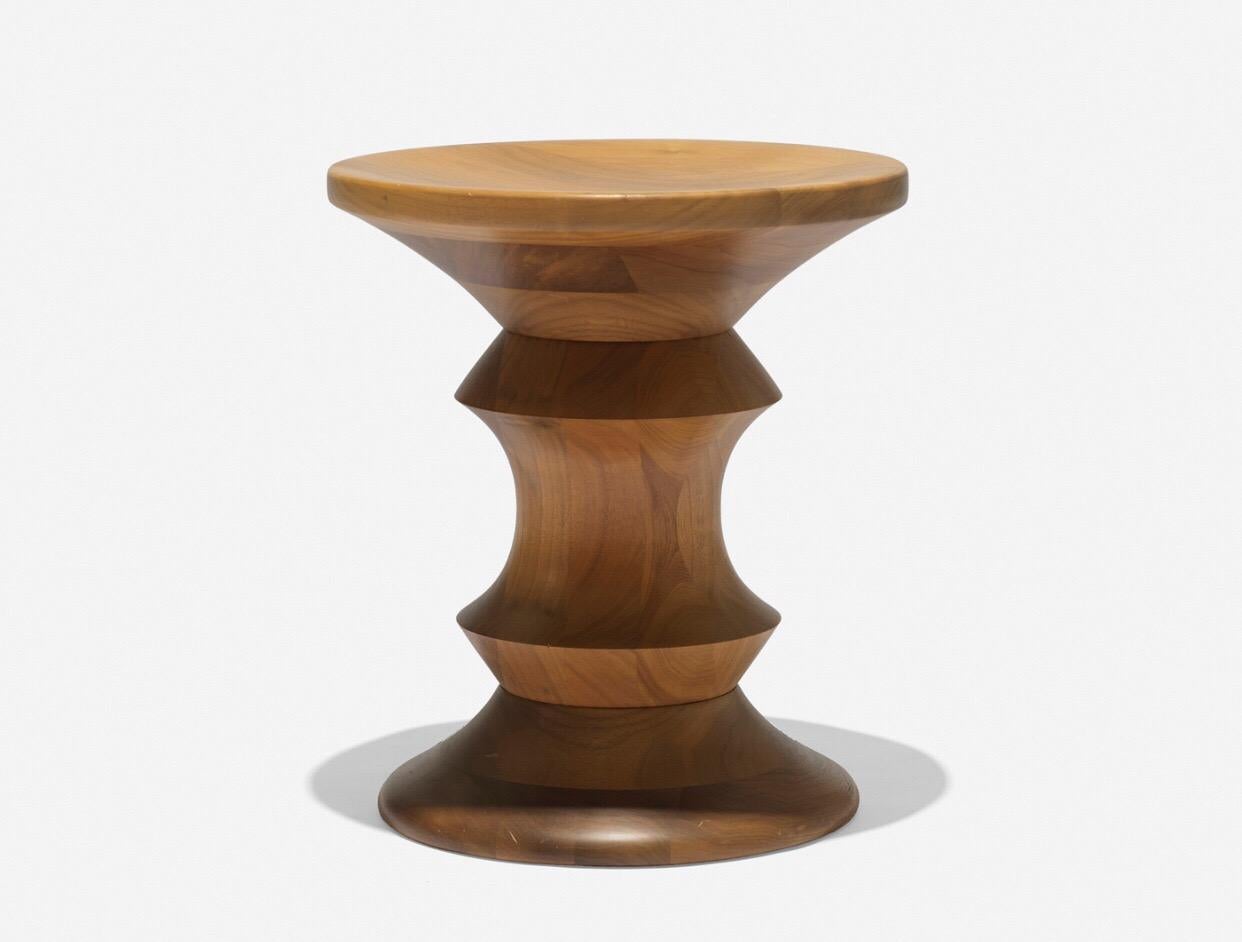 A lathe-turned wood stool by Charles and Ray Eames for Herman Miller, USA, circa 1950.

Ships from Hudson, NY.

Dimensions: 15 inches H x 13 inches W.