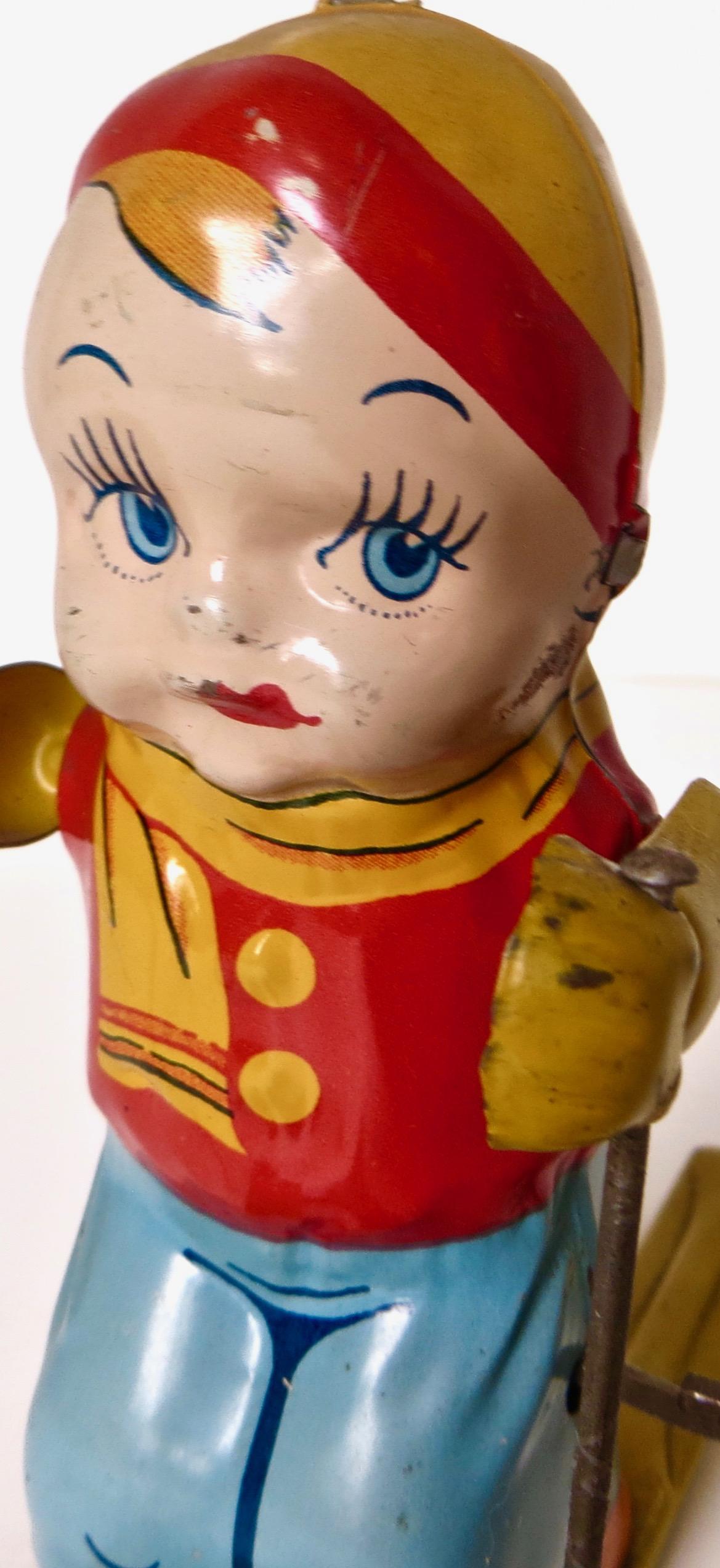Mid-20th Century Vintage Tin Wind Up Toy 