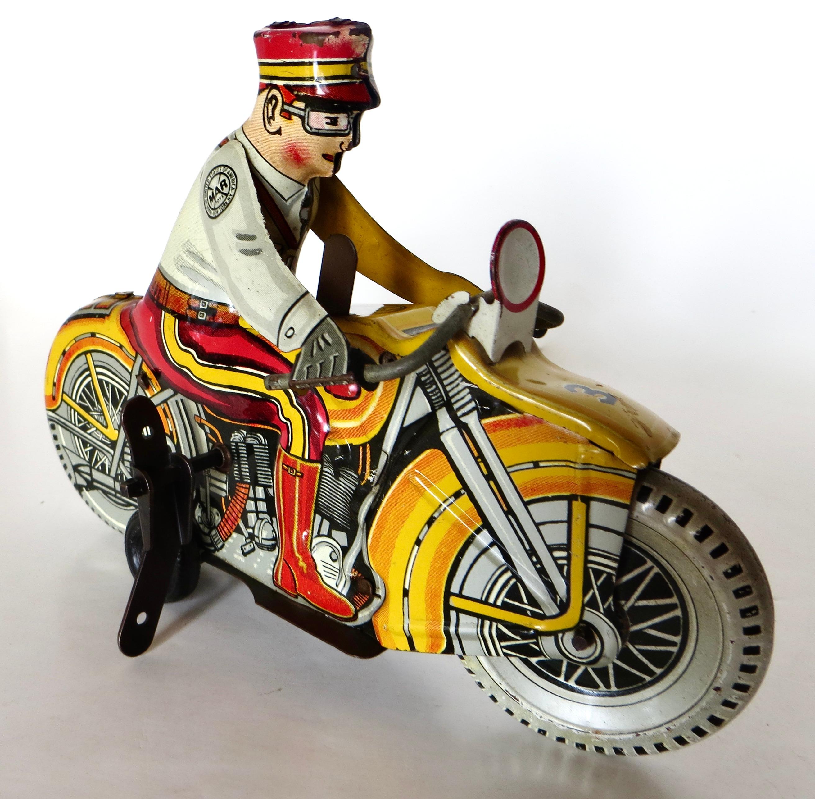 Pressato Giocattolo a vento di latta vintage di Louis Marx Toy Co. 