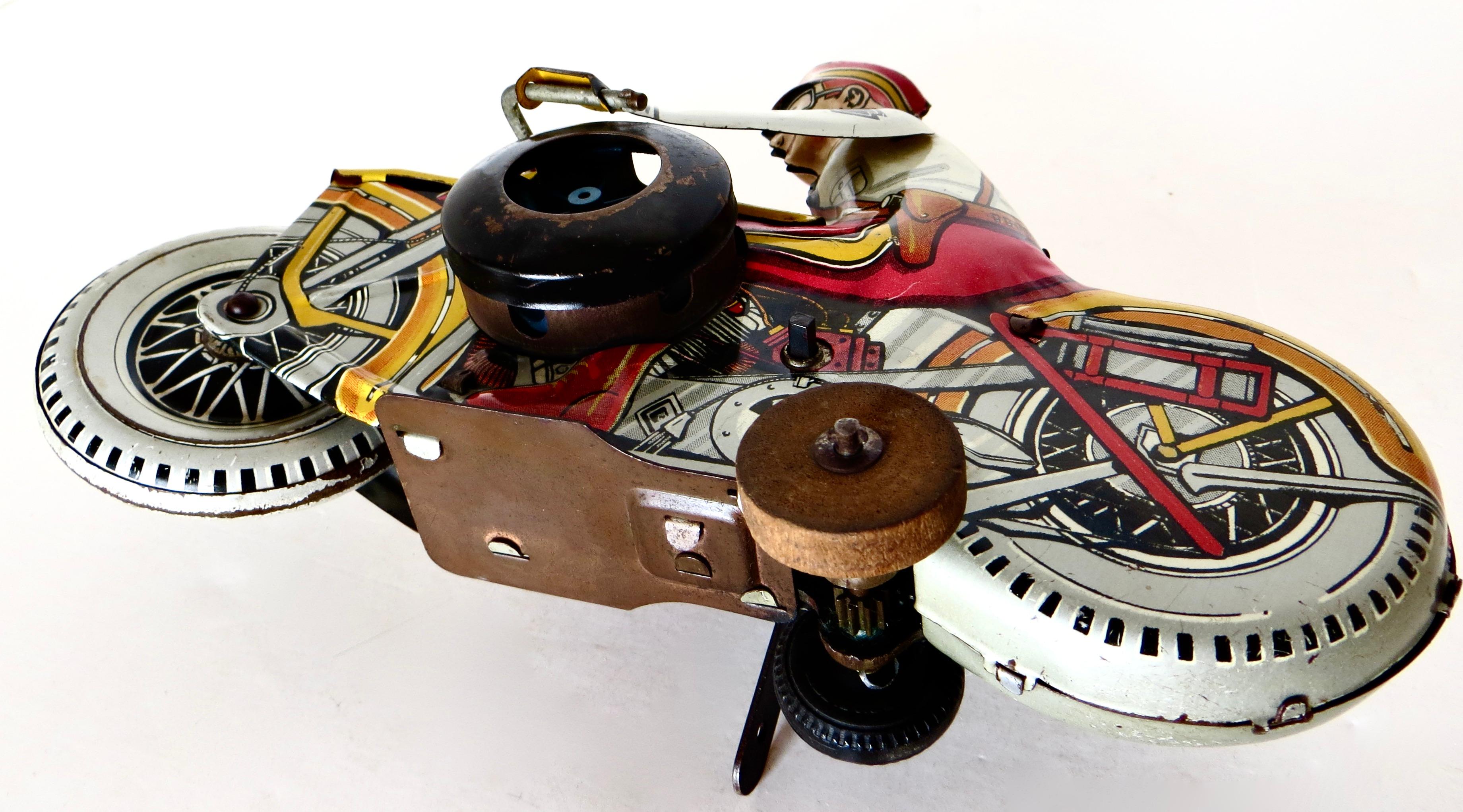 Giocattolo a vento di latta vintage di Louis Marx Toy Co. 