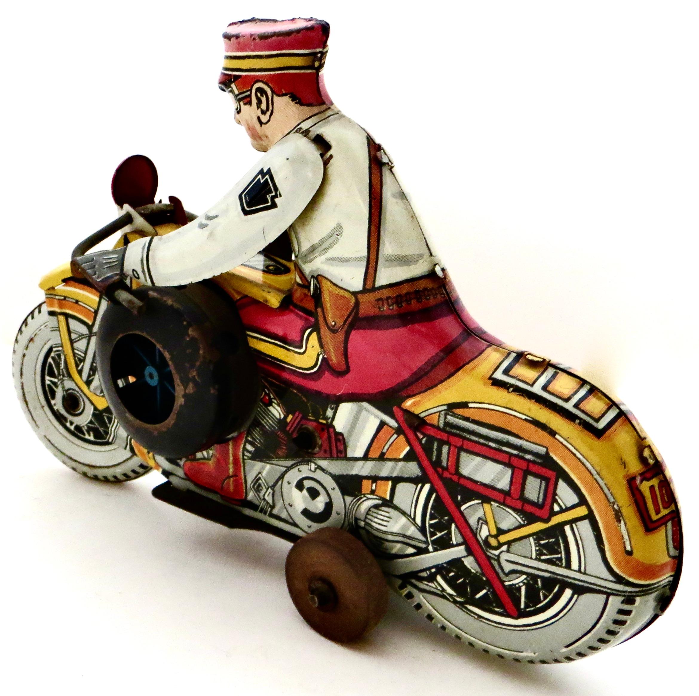 Giocattolo a vento di latta vintage di Louis Marx Toy Co. 