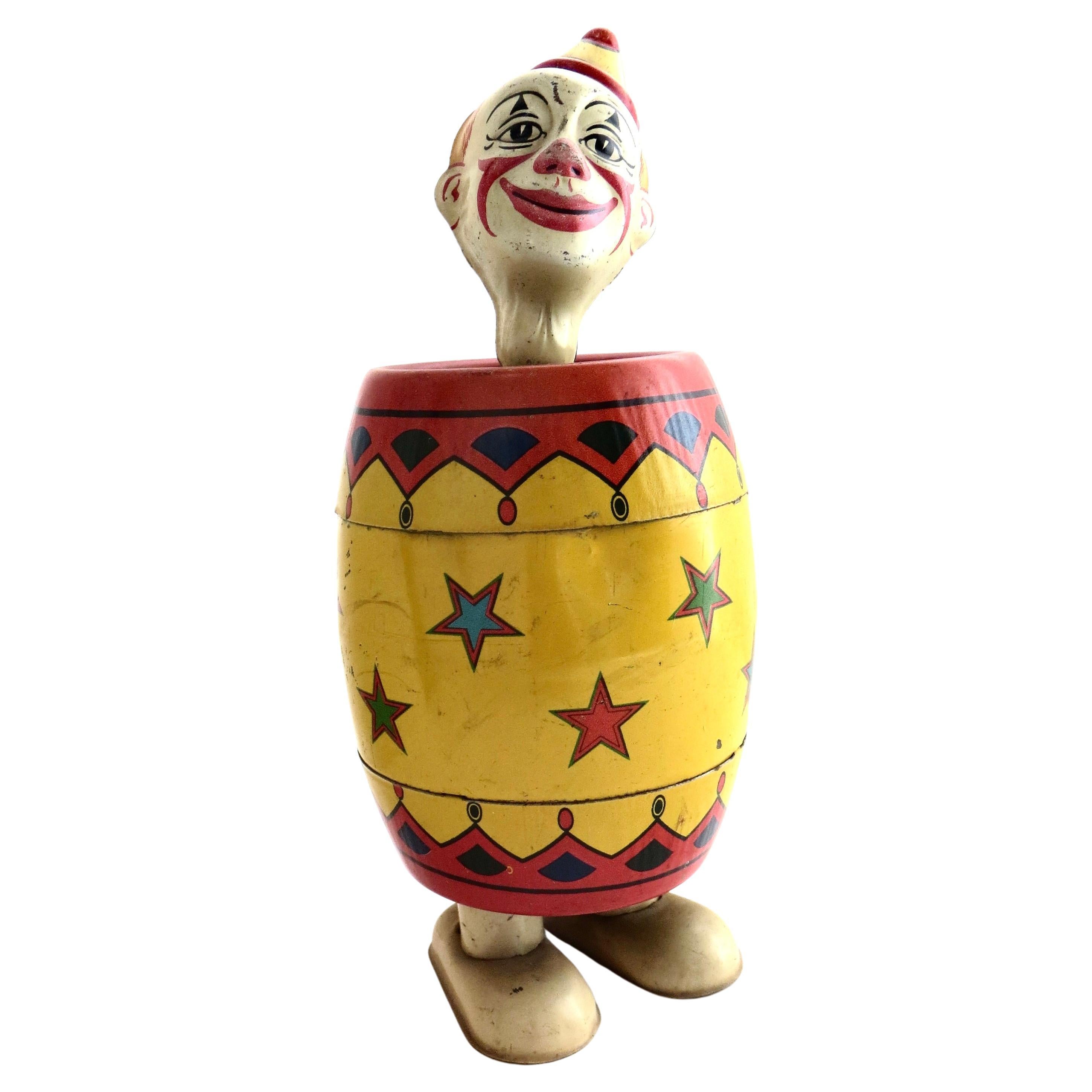 Vintage Tin Wind-up Toy "Clown in A Barrel" by J Chein & Co. American Circa 1935 For Sale