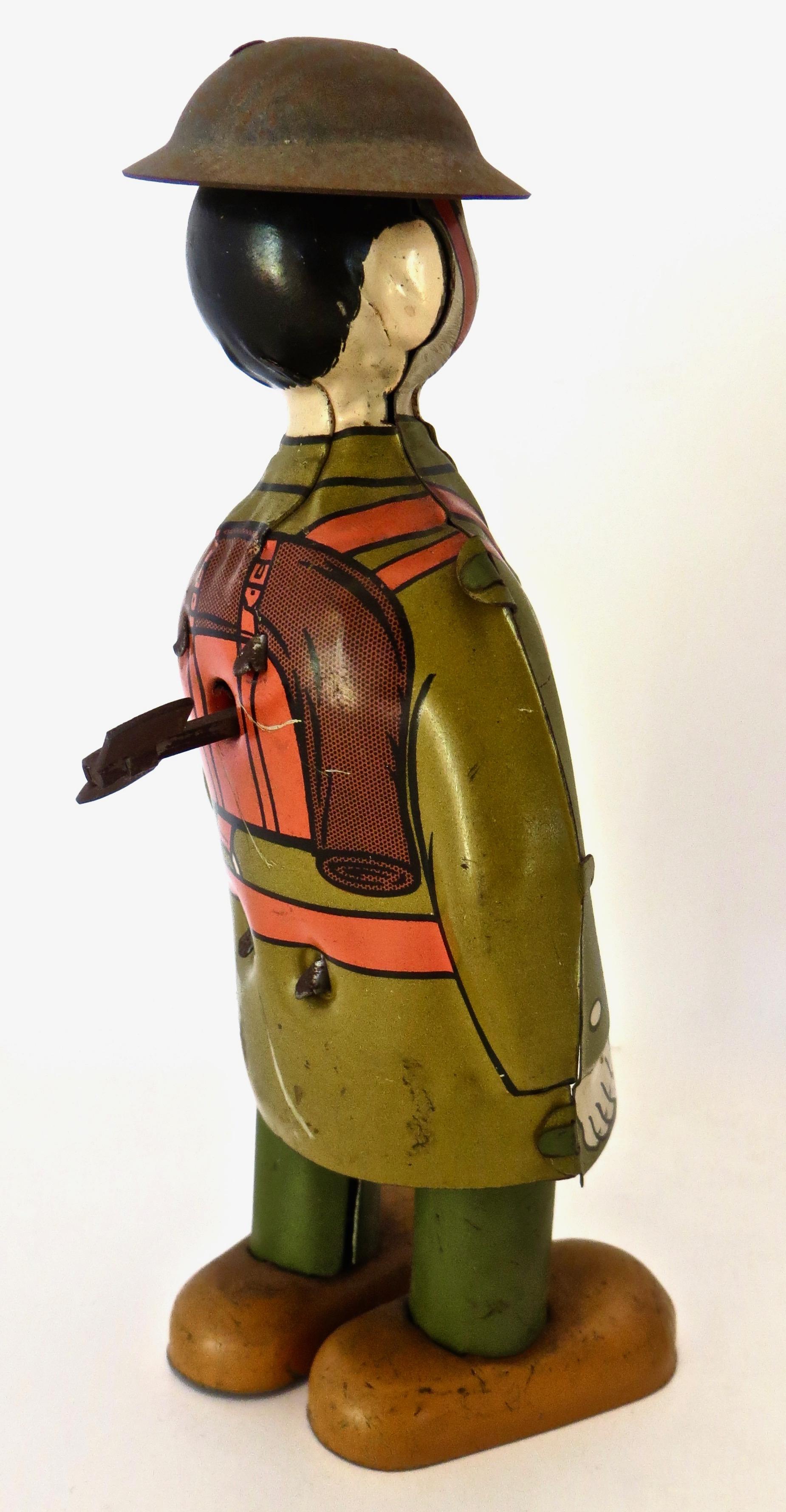 Of American manufacture, by the J. Chein Toy Company in New York City; this early 1930's vintage tin toy depicts a World War I 
