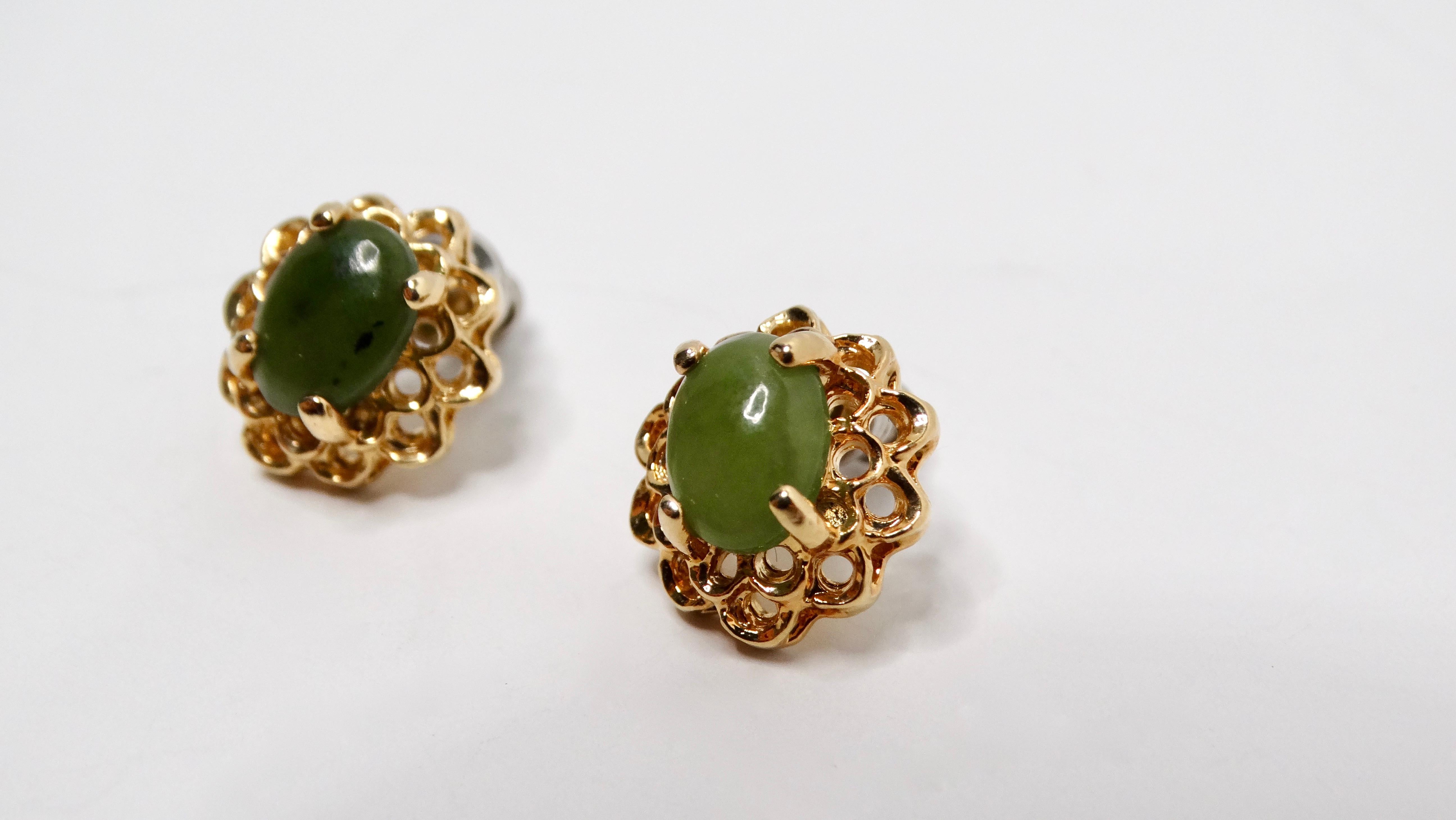 These Vintage Tiny Two-Toned Jade 18k Gold Plated Filigree Stud Earrings are a striking pair of jewelry that effortlessly blend color and elegance. Crafted from costume jade, one earring showcases a rich dark green hue, while the other presents a
