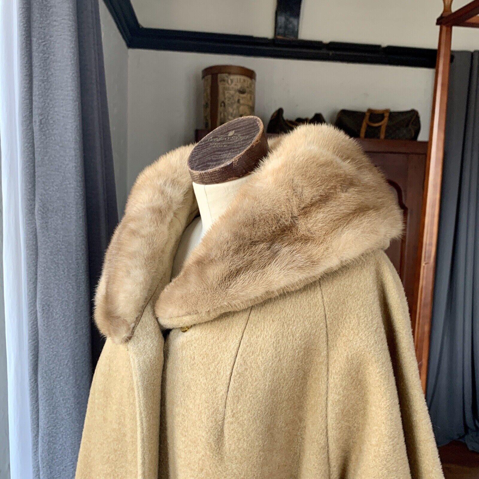 Lilli Ann, Tisse a Paris, One Button Hidden Top Closure, Pink Satin Lining, Two Satin Lined Pockets, Mink Fur Collar, Heavy Weight, 3/4 Sleeve, Beautiful Coat

Measurements Laying Flat

Bust up to 26