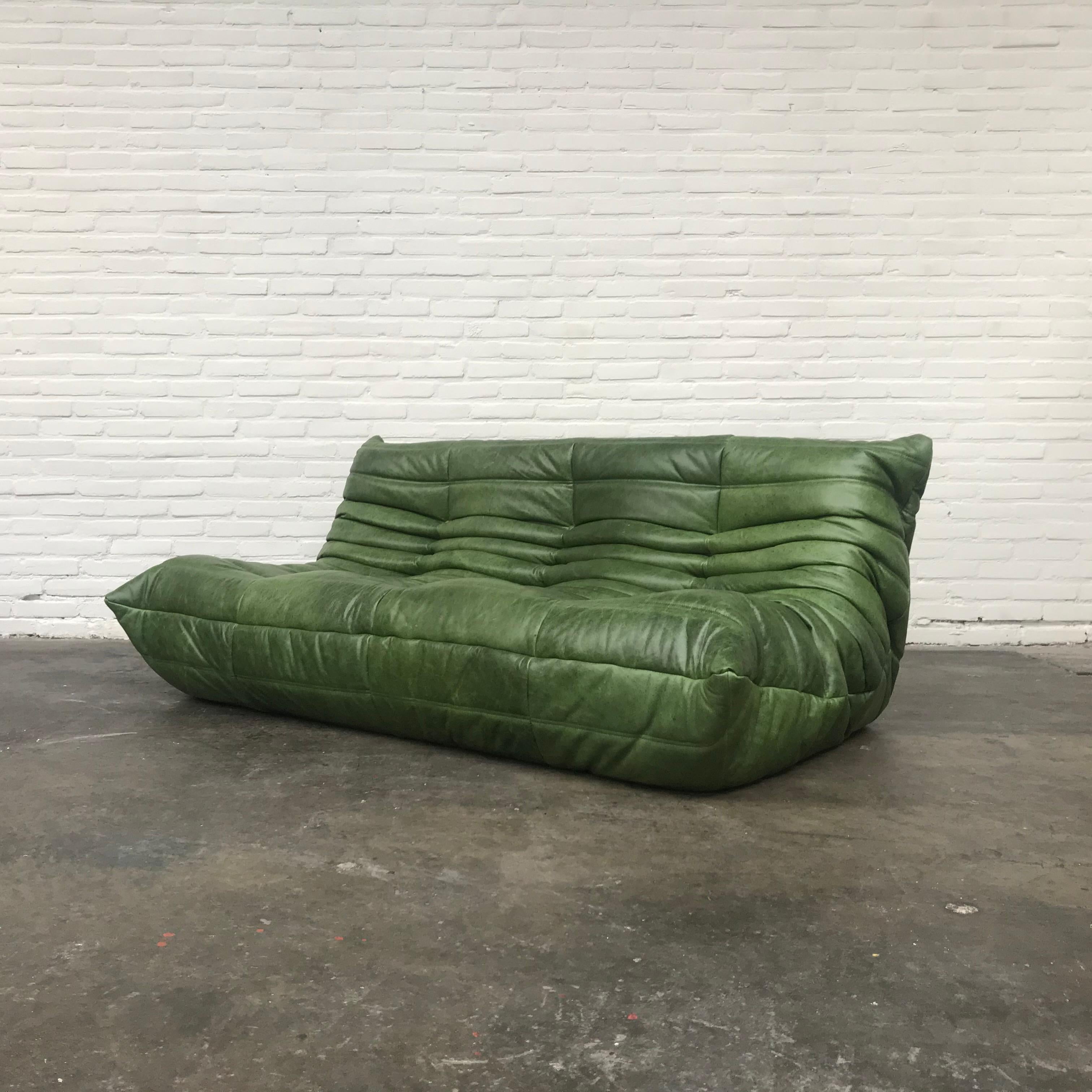 The Togo designer Classic was designed in France by Michel Ducaroy in 1974. This piece is restored and newly upholstered in fine Italian green leather. Upon agreement with Ligne Roset the label is not reaffixed.

 