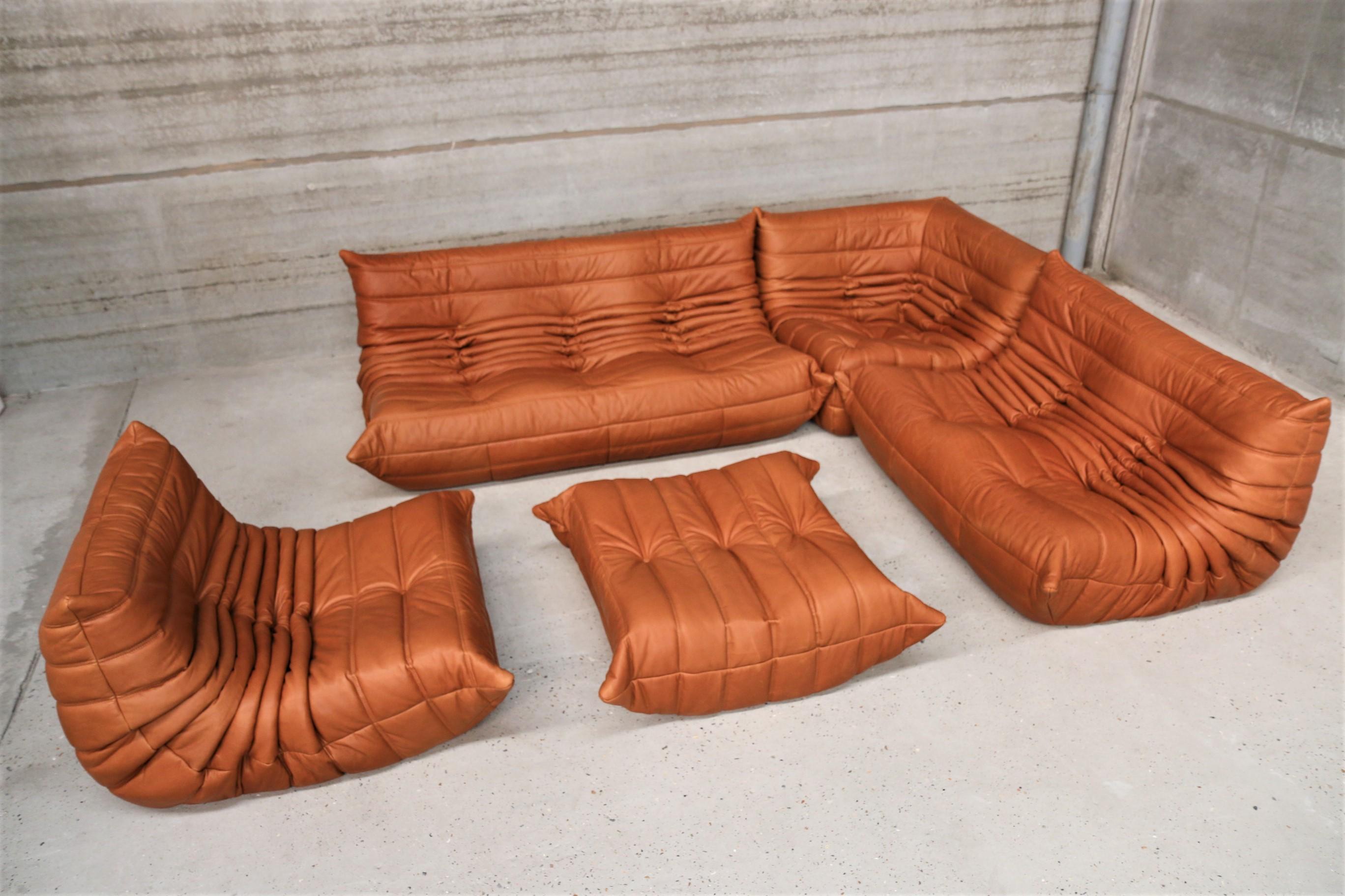 Iconic French vintage sofa lounge set, beautifully reupholstered with our signature full grain cognac leather.
Original genuine vintage 
