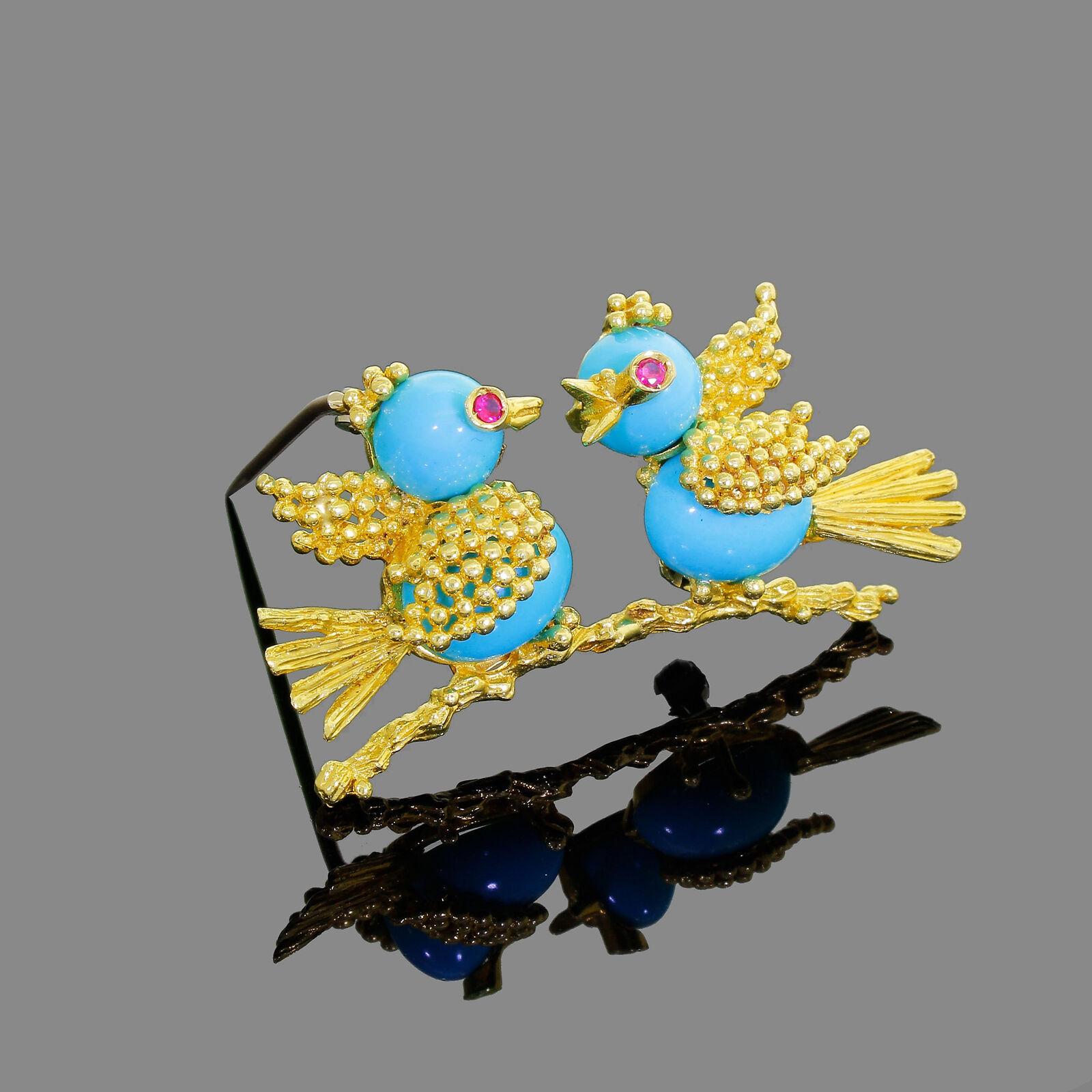 Details & Condition: Beautiful vintage 18k yellow gold signed Toliro pair of love birds.
As with all couple's one look's like he is listening intently to what the Mrs has to say :) and looking quite elegant while doing it!
The brooch is in excellent