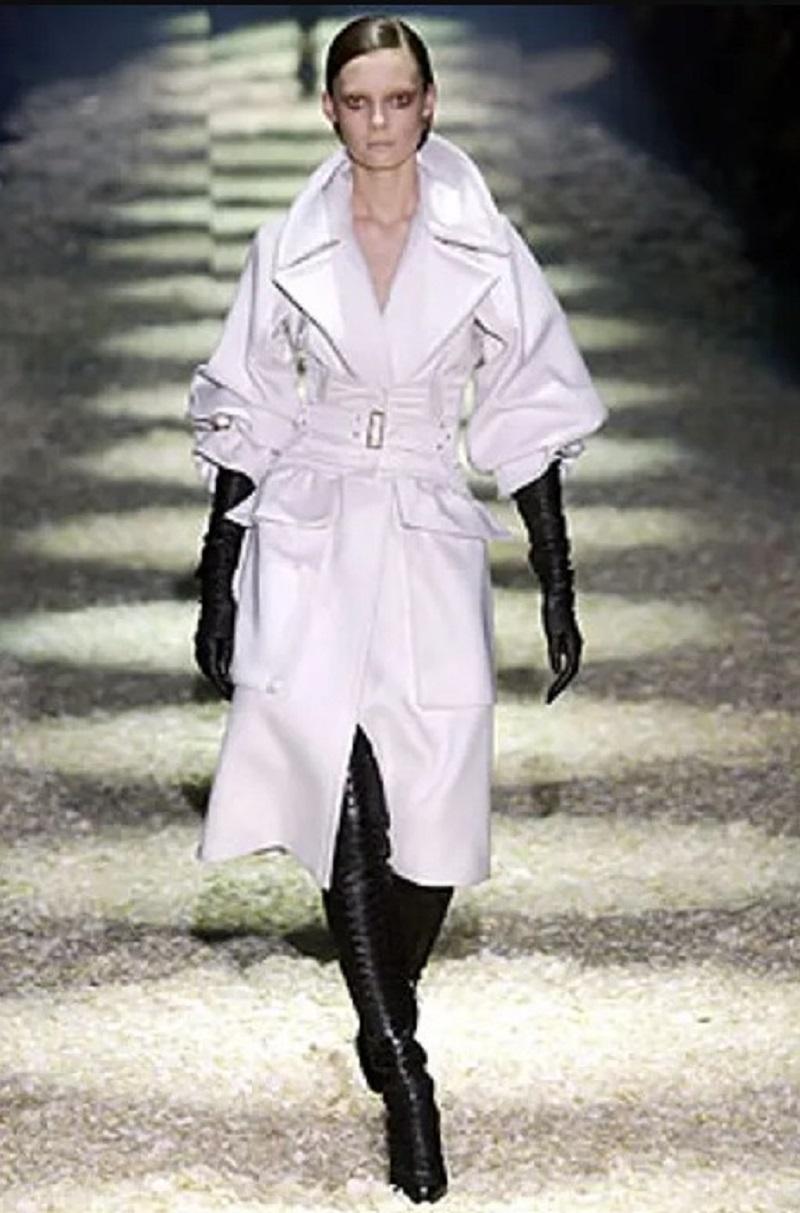 Gucci by Tom Ford Fall/Winter 2003 Black Python Over-the-Knee Boots
Striking and iconic, these over-the-knee boots from Gucci by Tom Ford’s Fall/Winter 2003 collection embody the designer’s signature provocative glamour. Crafted in sumptuous black
