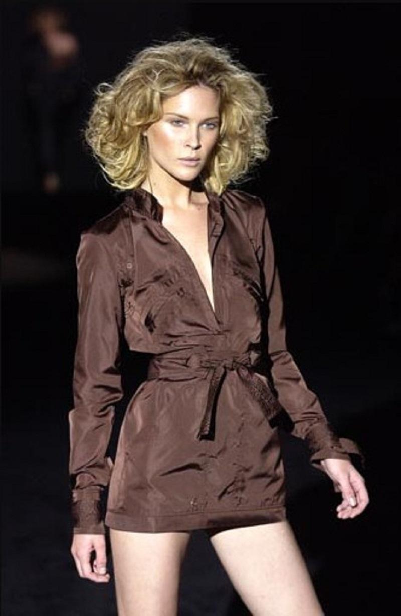 A true archival Tom Ford era Gucci piece, perfect for collectors and fashion enthusiasts.
Rare and collectible Gucci by Tom Ford mini dress from the Spring/Summer 2003 collection. Crafted in luxurious black dupioni silk, this striking piece features