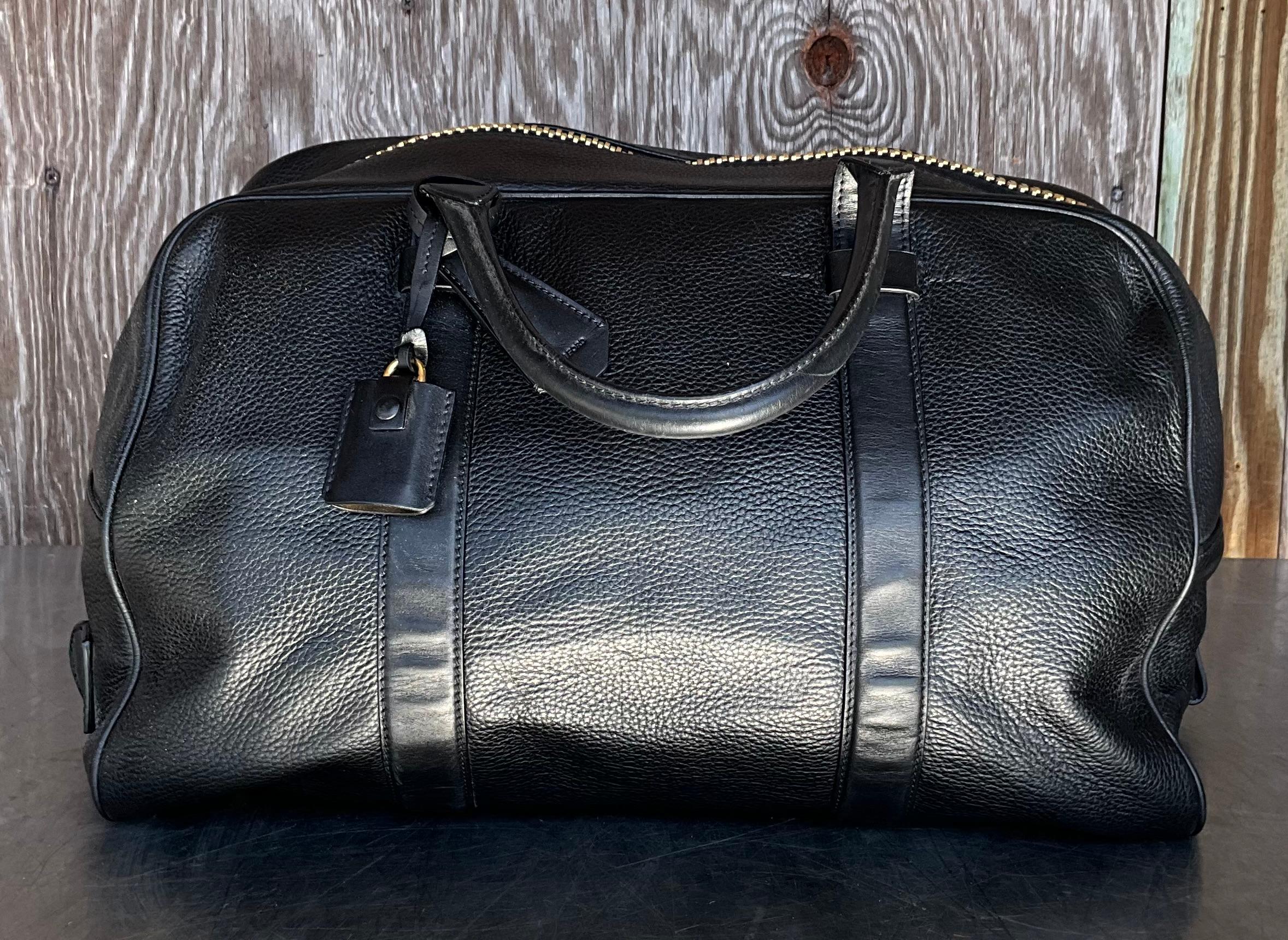 A Vintage Tom Ford Leather Travel Bag is an iconic piece that combines luxury, functionality, and timeless style. Known for his meticulous craftsmanship and sophisticated designs, Tom Ford’s leather goods, especially travel bags, are often seen as