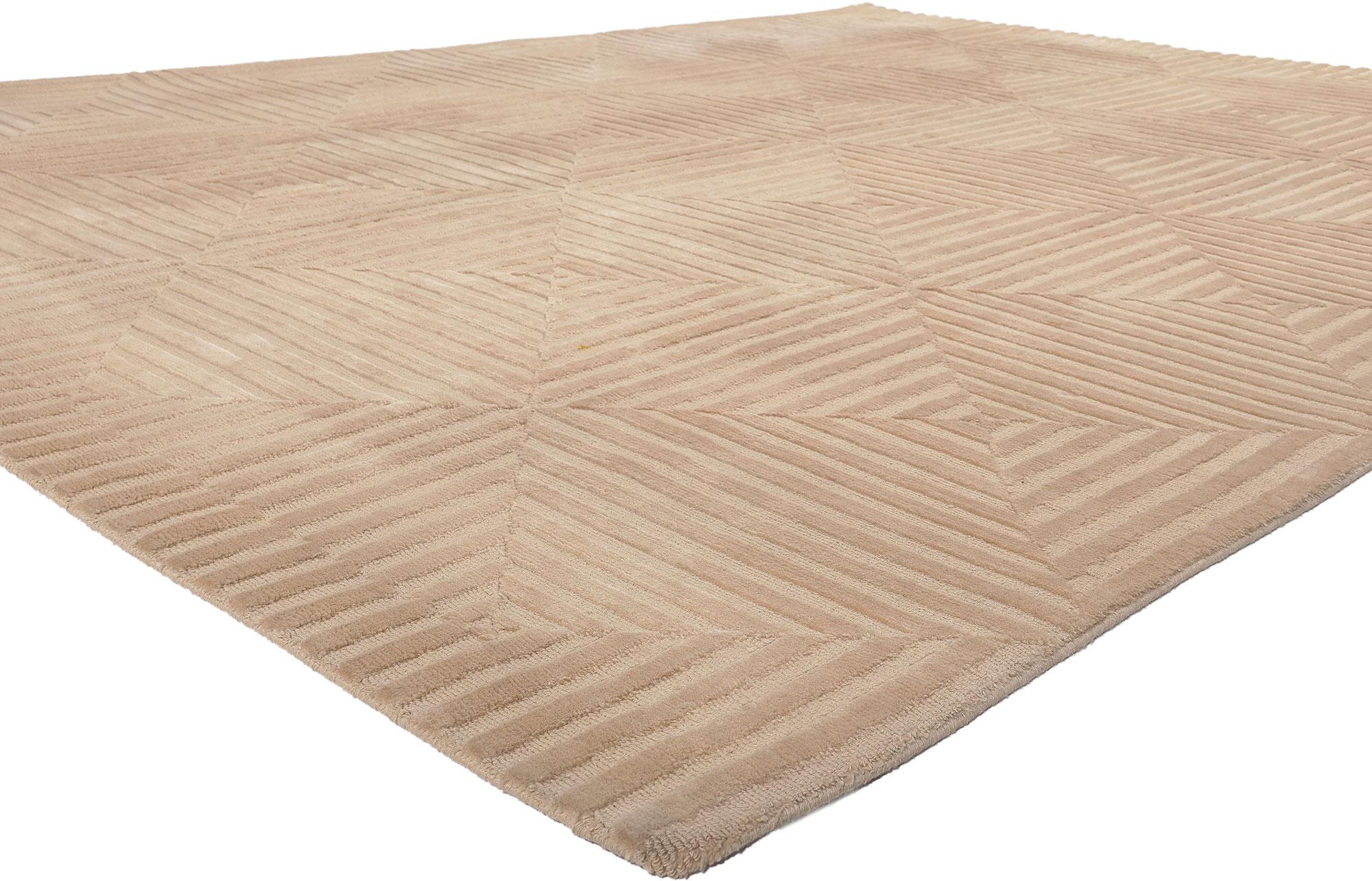 77307 Vintage Tibetan High-Low Rug, 08'07 x 11'04.
Subtle Shibui meets sublime simplicity in this hand knotted wool vintage Tibetan high-low rug. The zen-like silhouette and neutral colors woven into this piece work together resulting in a warm,