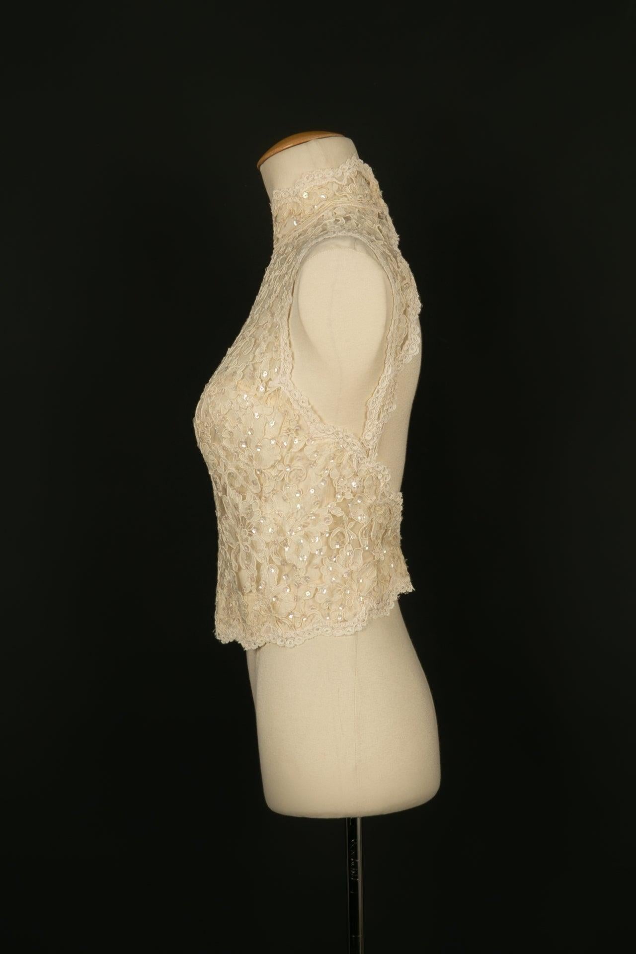 Unknown - Corset in white lace and sequins. No size indicated, it fits a 36FR.

Additional information:
Condition: Very good condition
Dimensions: Chest: 40 cm - Length: 47 cm

Seller Reference: FH174
