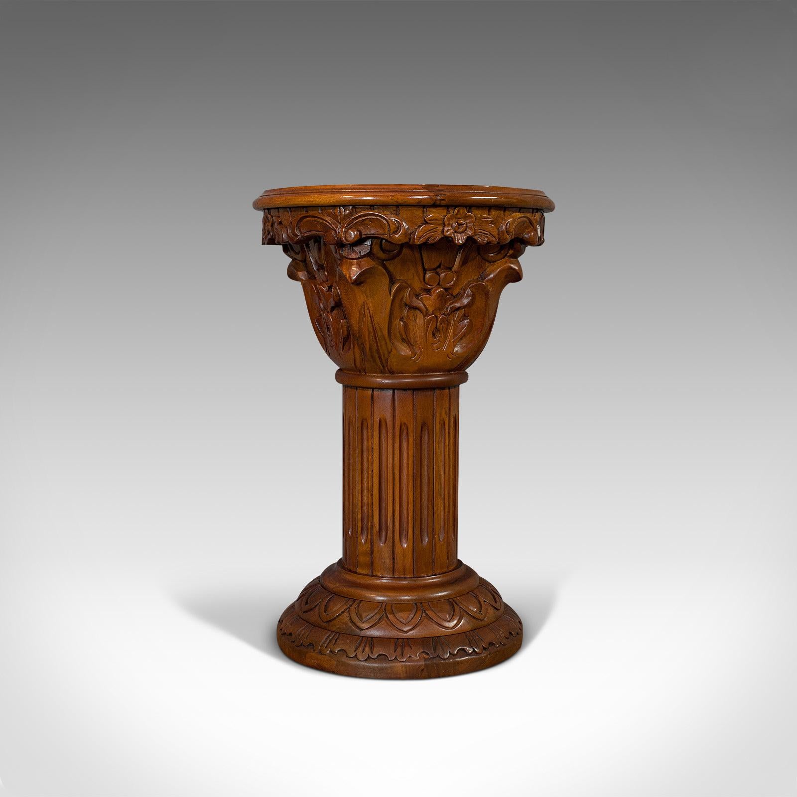 This is a vintage torchere stand. An oriental mahogany and marble jardinière or lamp table, dating to the late 20th century, circa 1980.

Deeply carved stand with appealing color
Displays a desirable aged patina
Select mahogany shows fine grain