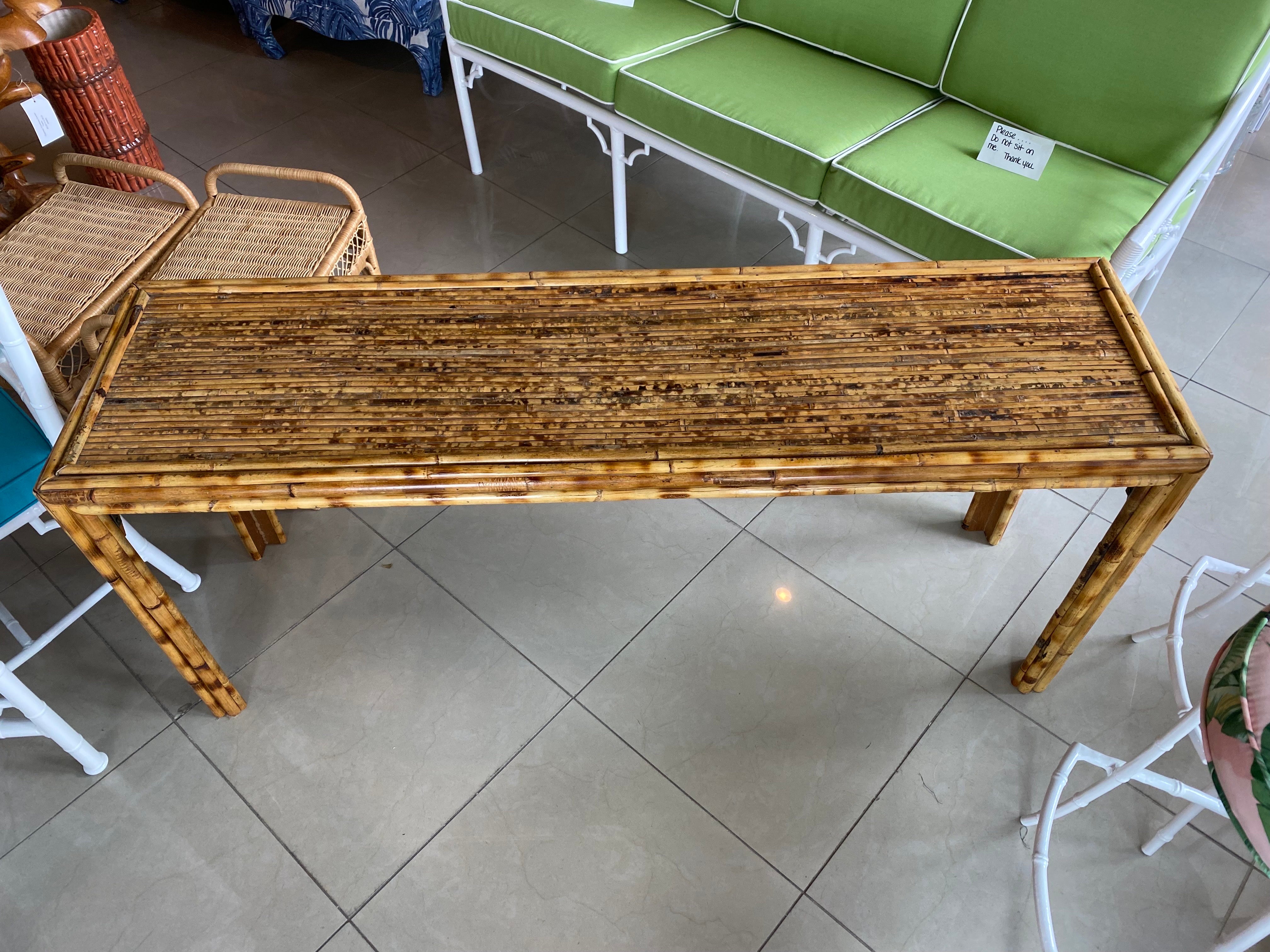 Vintage tortoise bamboo reed console table. No damage or defects. Dimensions: 26 H x 18 D x 60 W. Please contact me if you would like an additional shipping quote. 