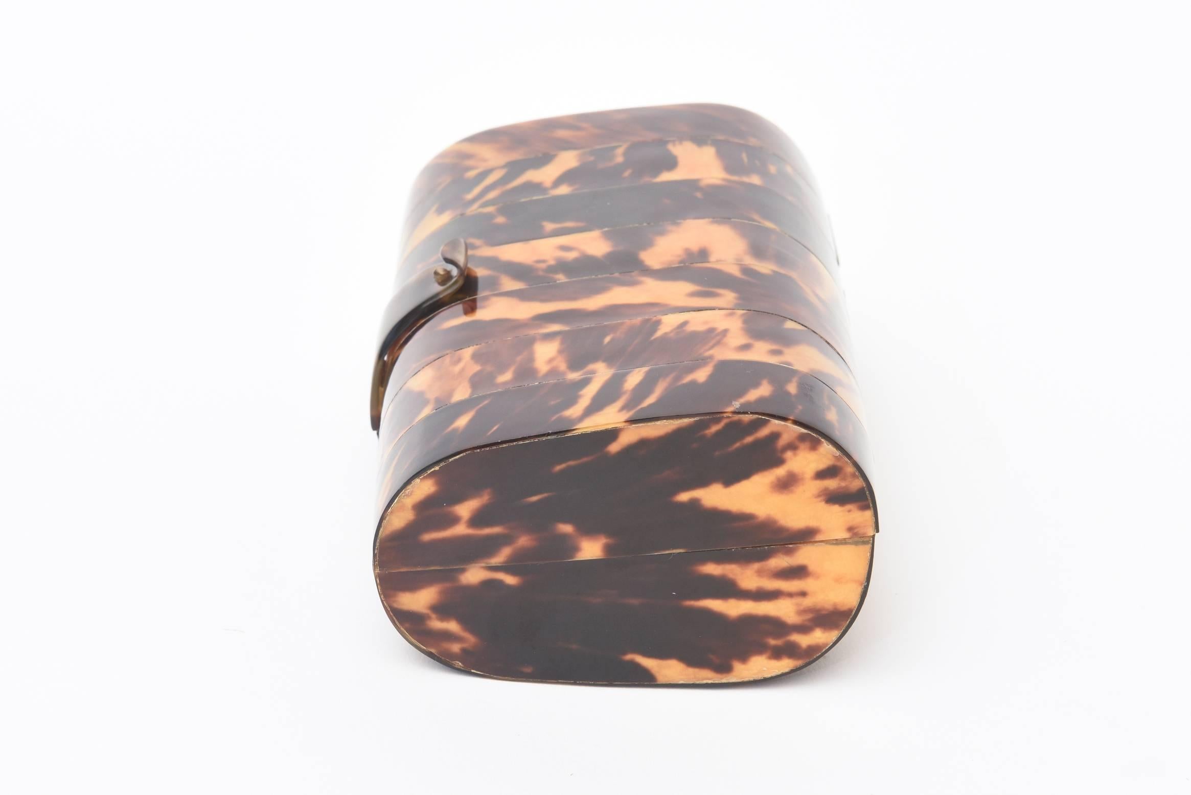 tortoiseshell clutch bag