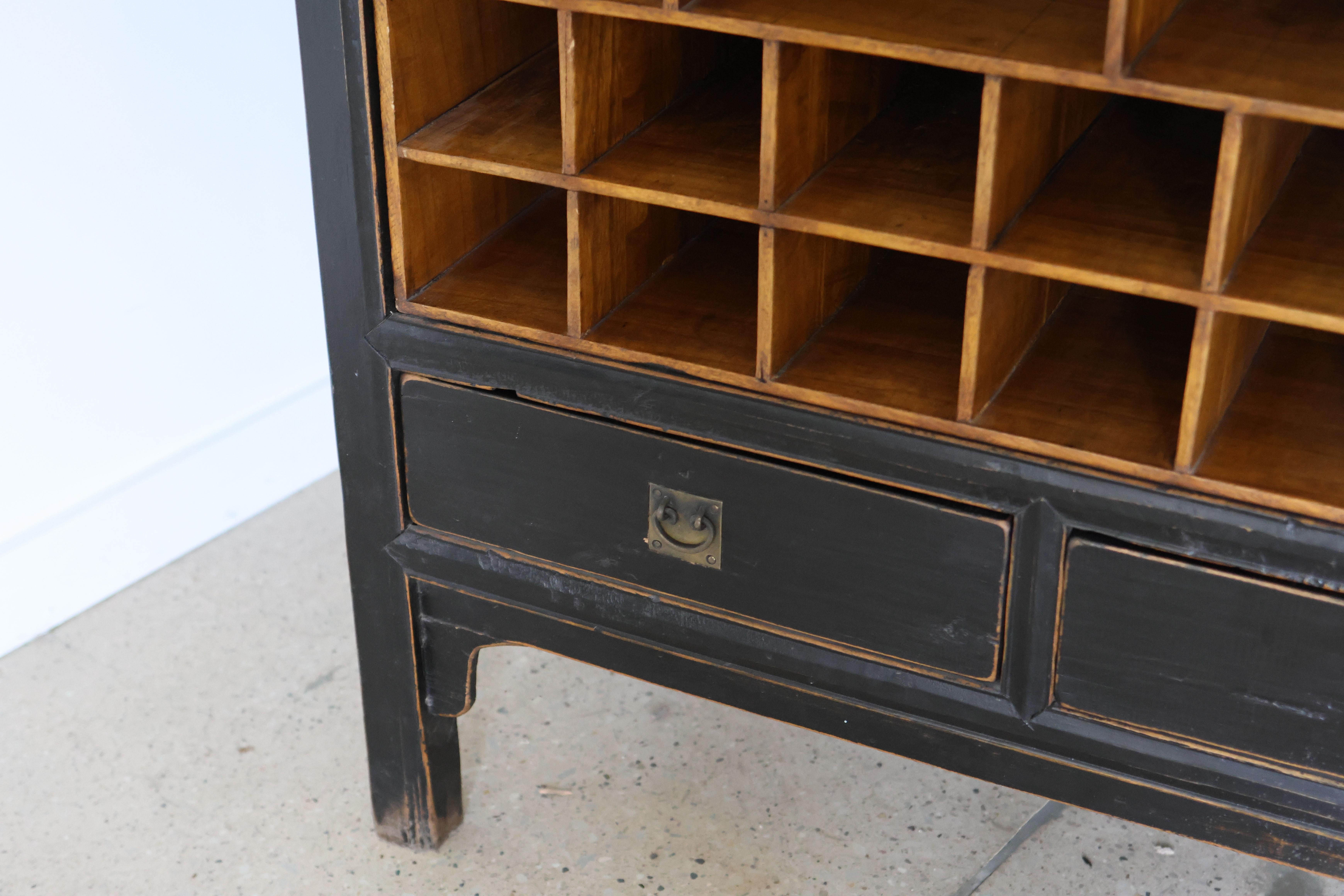 20th Century Vintage Towering Black Lacquered Salvaged Organizer/Apothecary Cabinet For Sale
